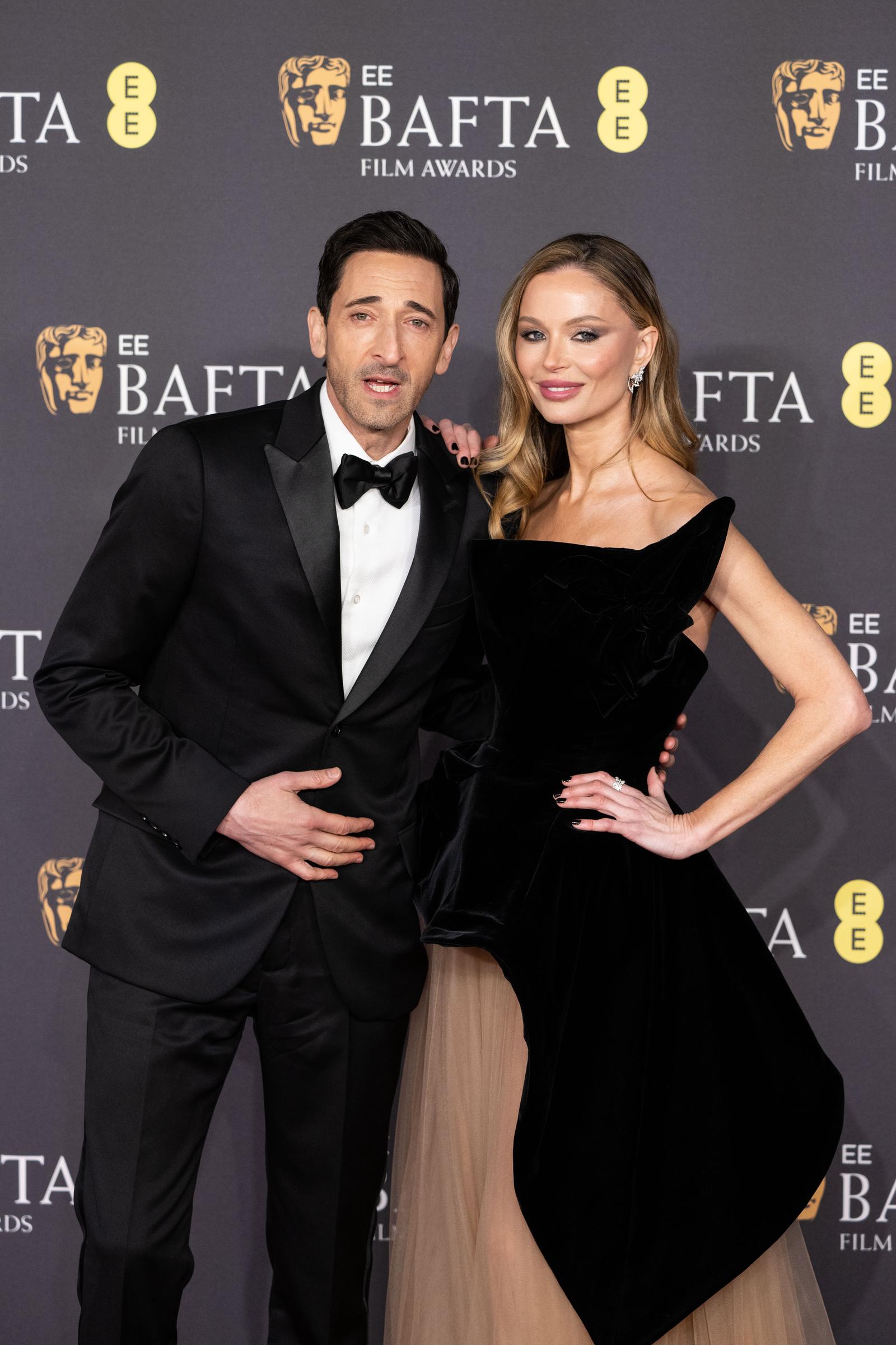 Adrien Brody and Georgina Chapman attend the 2025 EE BAFTA Film Awards on February 16, 2025 | Source: Getty Images