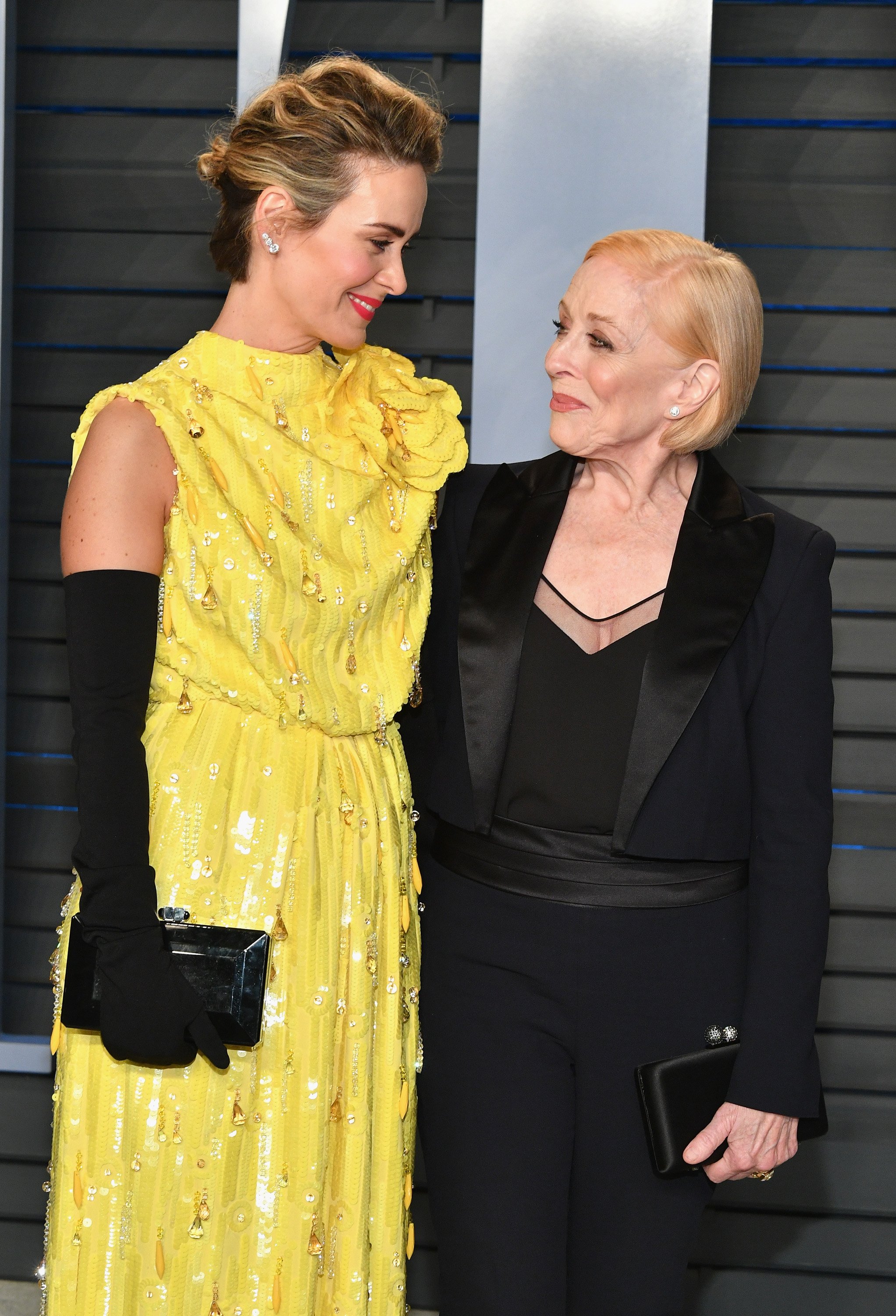 Sarah Paulson (L) and Holland Taylor attend the 2018 Vanity Fair Oscar Party hosted by Radhika Jones at Wallis Annenberg Center for the Performing Arts on March 4, 2018 in Beverly Hills, California | Source: Getty Images