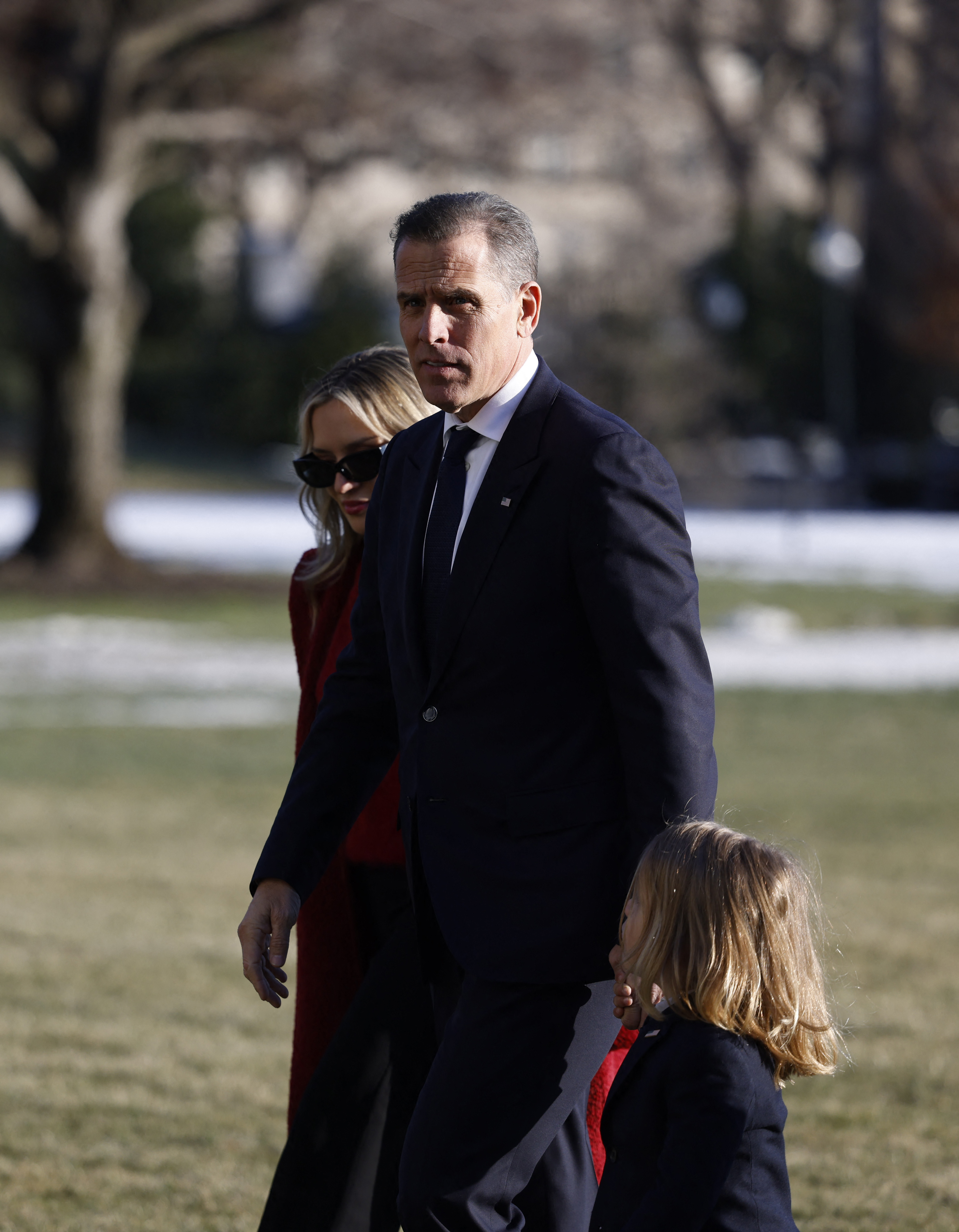 Hunter Biden, with his wife Melissa and their son Beau, returns to the White House in Washington, D.C., on January 17, 2025, after visiting Joint Base Andrews. | Source: Getty Images