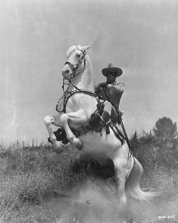 Clayton Moore as the "Lone Ranger" with his horse Silver in 1956. | Source: Wikimedia Commons.