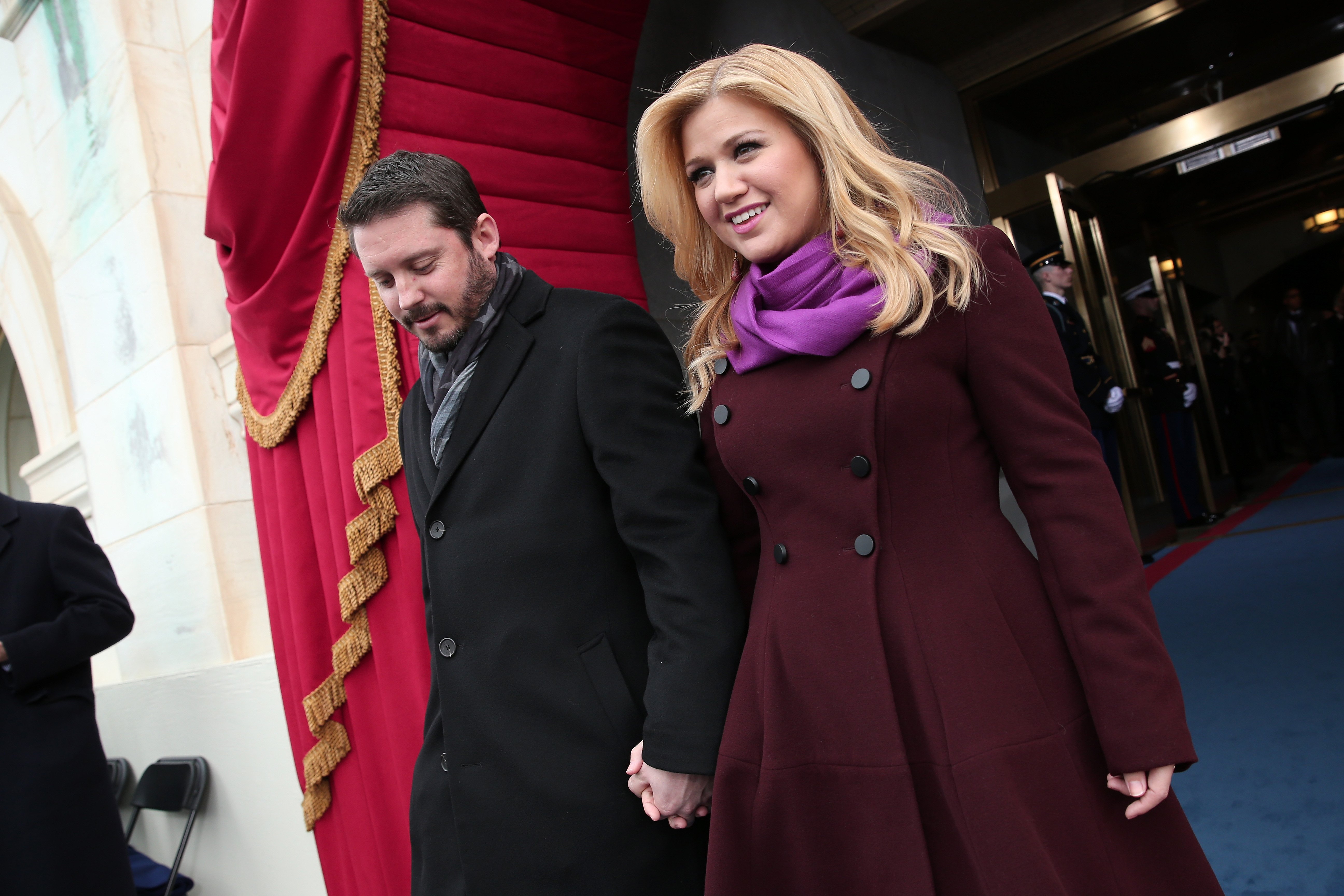 Kelly Clarkson and Brandon Blackstock arrive at the presidential inauguration on the West Front of the U.S. Capitol January 21, 2013 | Photo: Getty Images