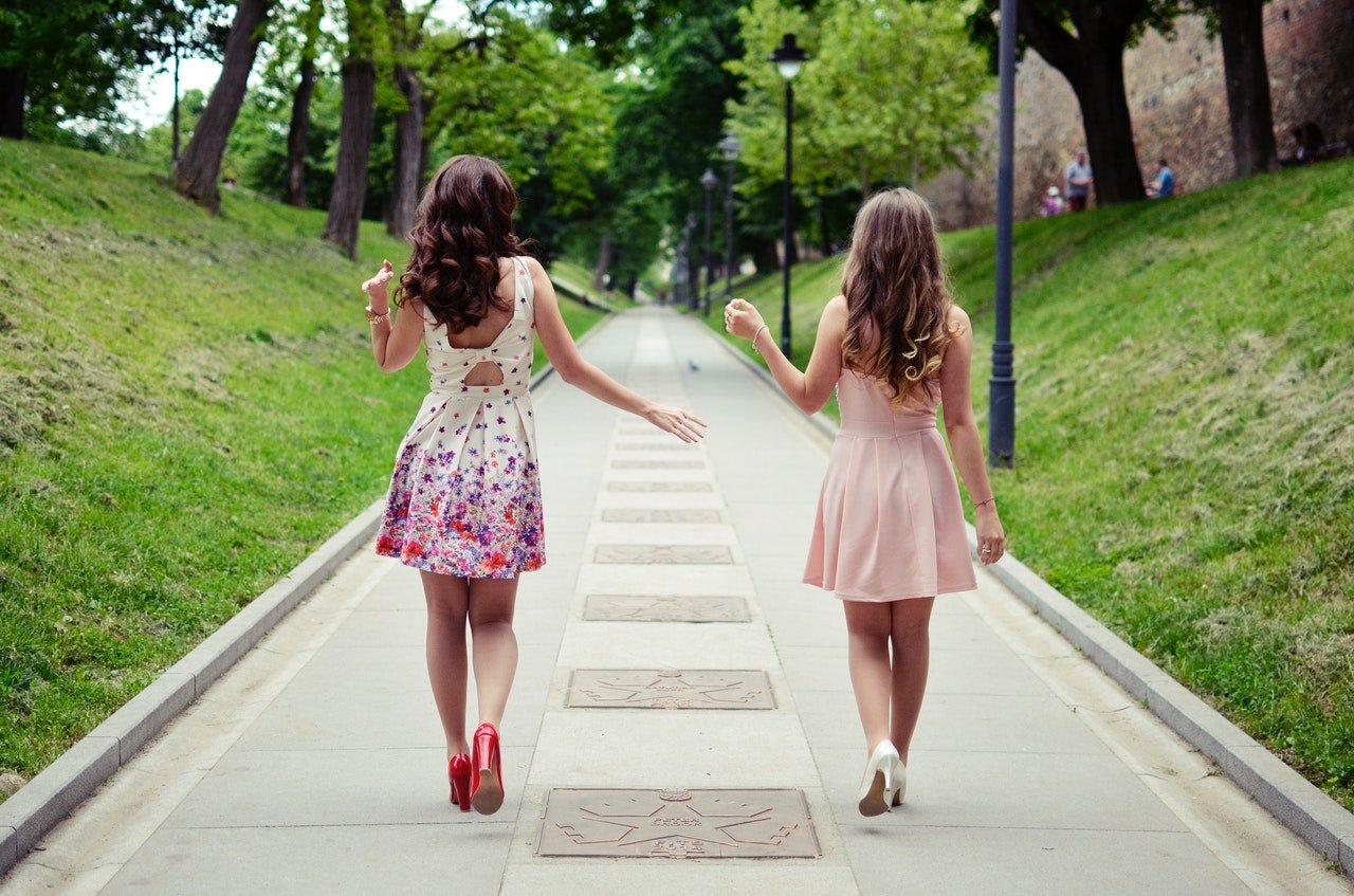 Two ladies having a walk | Photo: Pexels