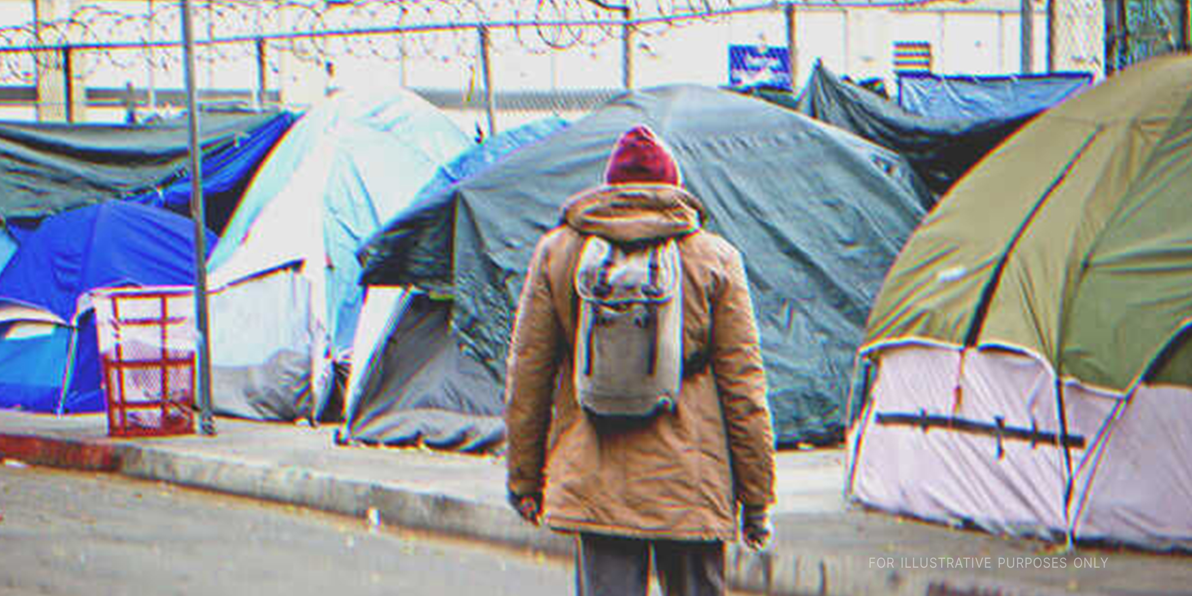 Homeless man approaching tents on sidewalk | Source: Shutterstock