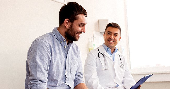 Two men having a discussion | Photo: Shutterstock