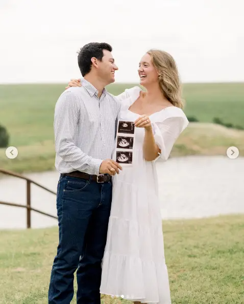 Standing together in a serene outdoor setting, Alex and Mauricio beamed with excitement as they held their baby's ultrasound. This peaceful scene captures their love and anticipation for the newest addition to the Drummond-Scott family. | Source: Instagram/alexmariedrum / mauricioscott03