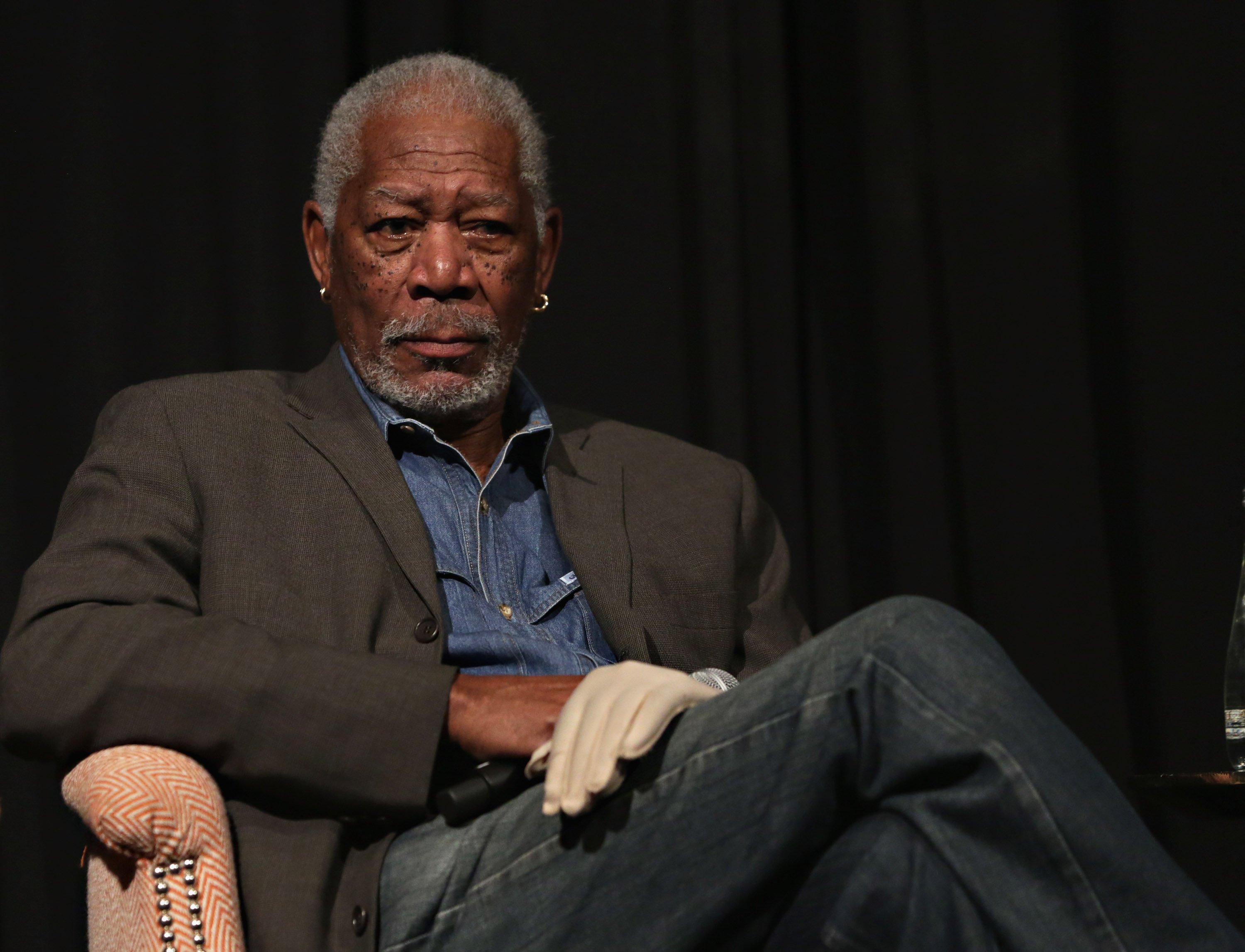 Morgan Freeman sitting | Getty Images