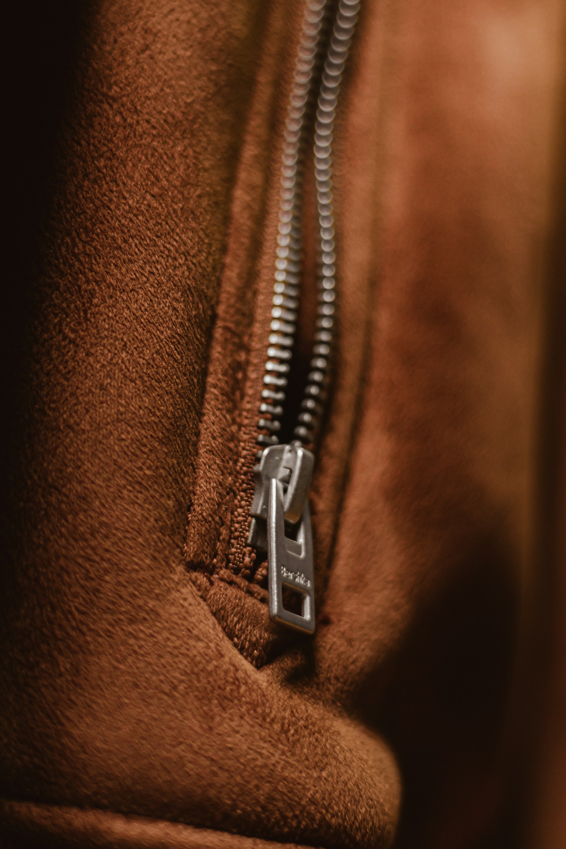 Close-up shot of a zipper | Source: Unsplash