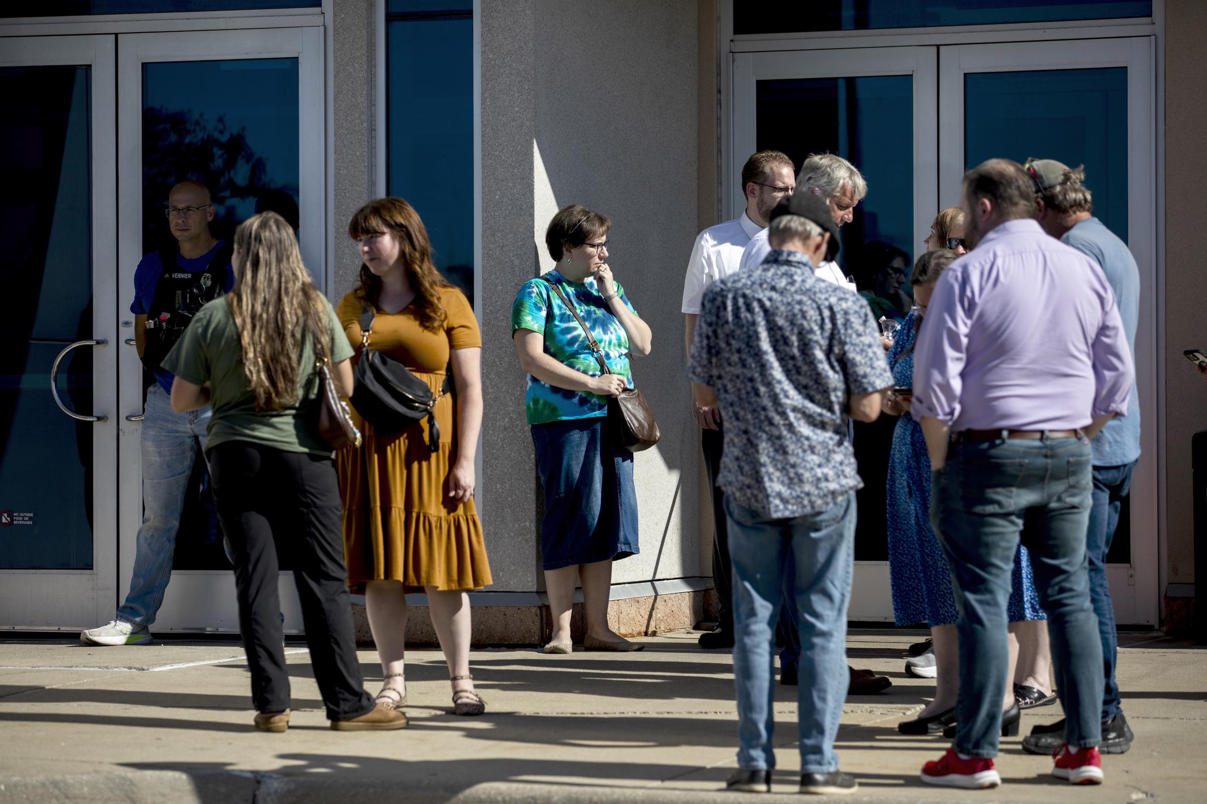Church members reunite at Trillium Theater across from the site of a shooting and fire at the Church of Jesus Christ of Latter-day Saints on September 28, 2025 | Source: Getty Images