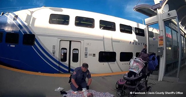 Cop changes baby’s diaper on train platform after mom suffered a psychiatric episode