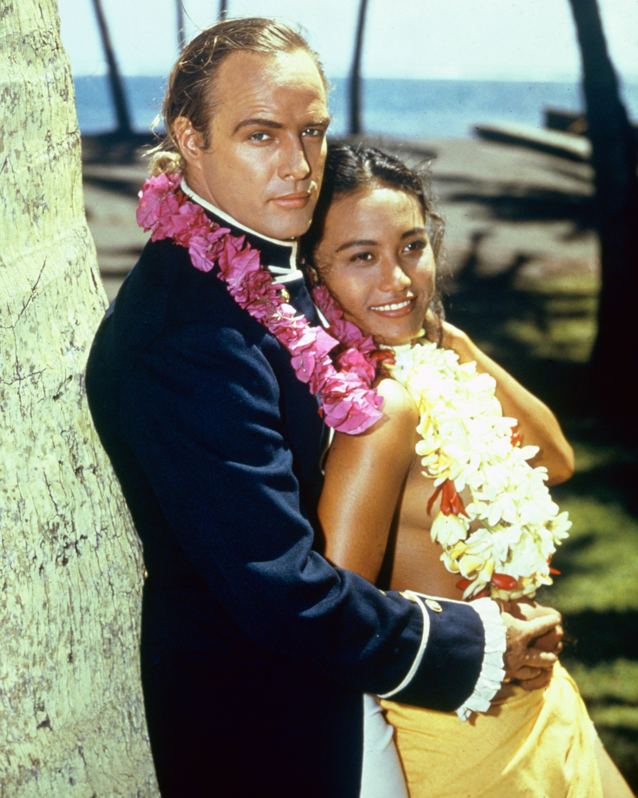 US actor Marlon Brando with French Polynesian actress Tarita Teriipia posing for a publicity portrait for the 1962 film "Mutiny on the Bounty" | Source: Getty Images