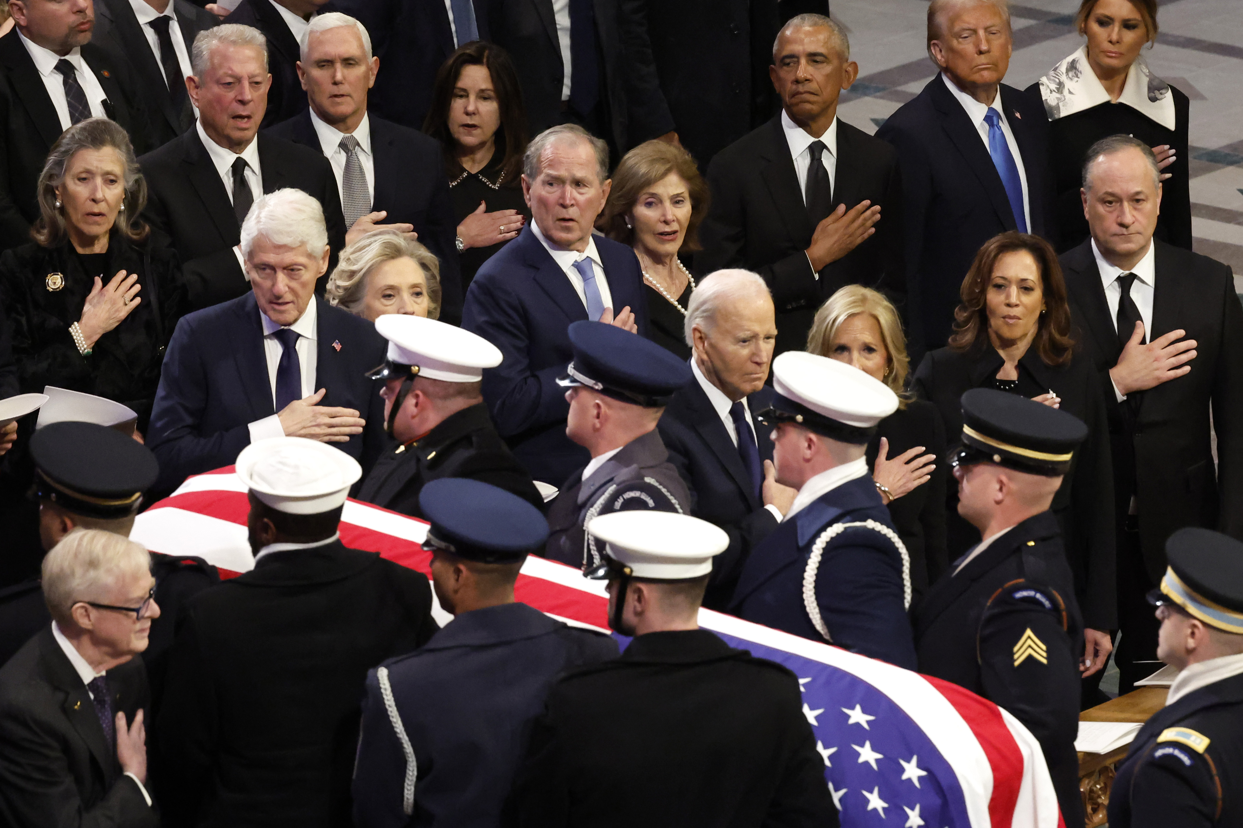 Presidents Joe Biden, Donald Trump, Barack Obama, George W. Bush, and Bill Clinton, along with first ladies Jill Biden, Melania Trump, Laura Bush, and Hillary Clinton, attend Jimmy Carter's state funeral at Washington National Cathedral on January 9, 2025 | Source: Getty Images