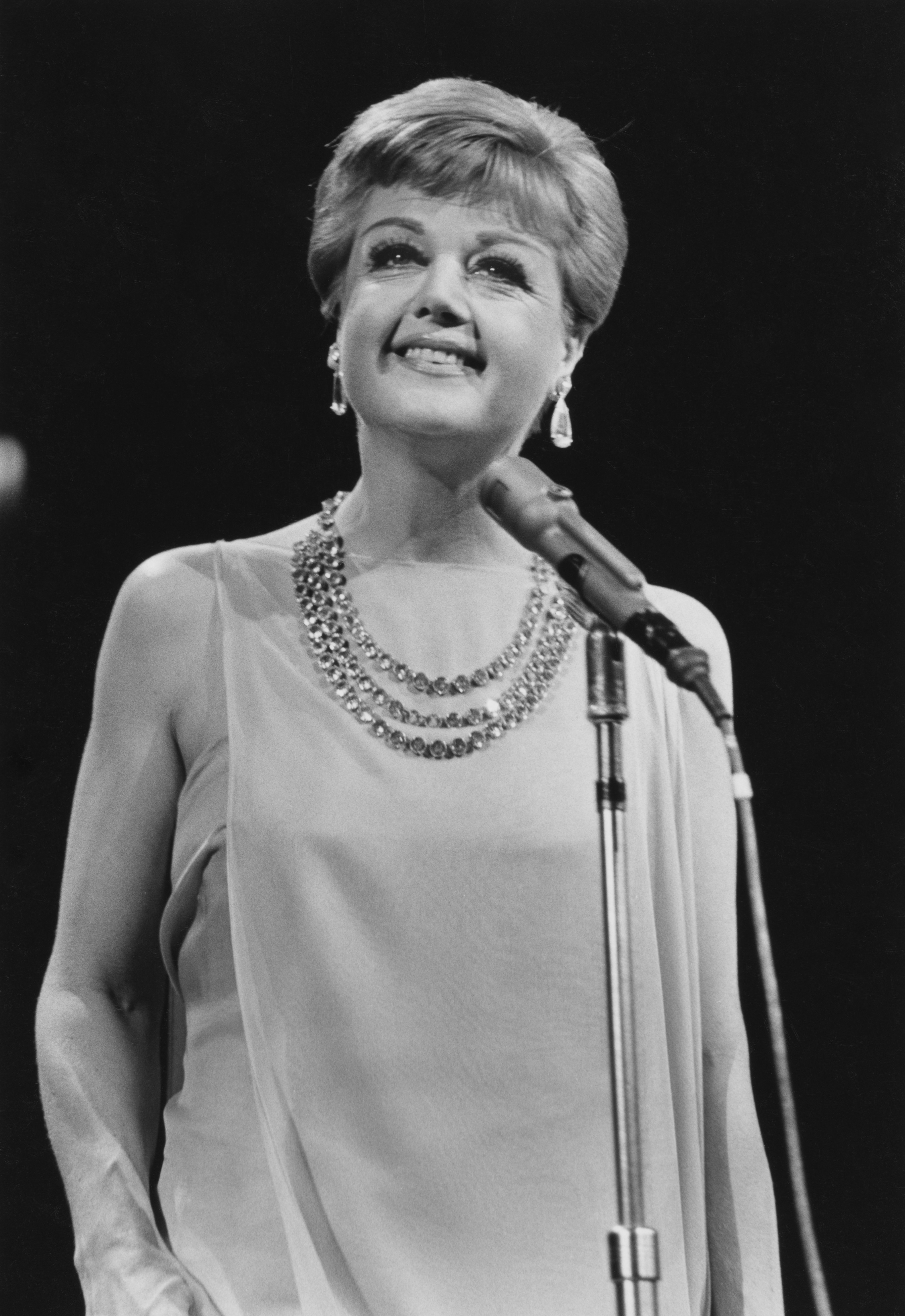 Irish-British actress Angela Lansbury on stage at the 'Stars Salute To Israel' show, staged at Madison Square Garden in New York City, New York, 11th June 1967. | Source: Getty Images