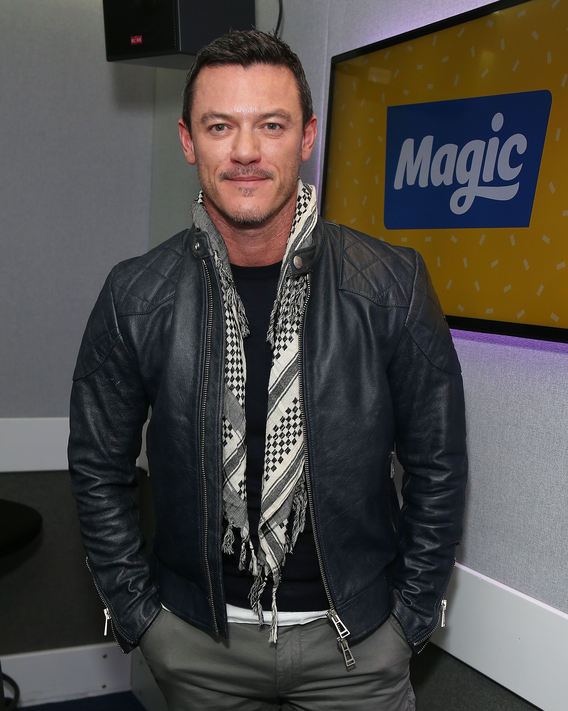 Luke Evans at Tom Price and Emma B at Magic Radio on March 28, 2018. | Photo: Getty Images