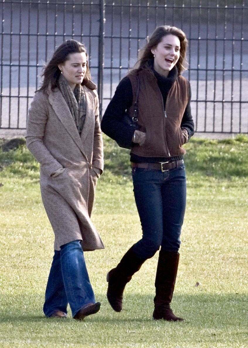 Kate Middleton pictured walking with her sister Pippa Middleton at Windsor after watching a rugby match on Marcg 18, 2007┃Source: Getty Images