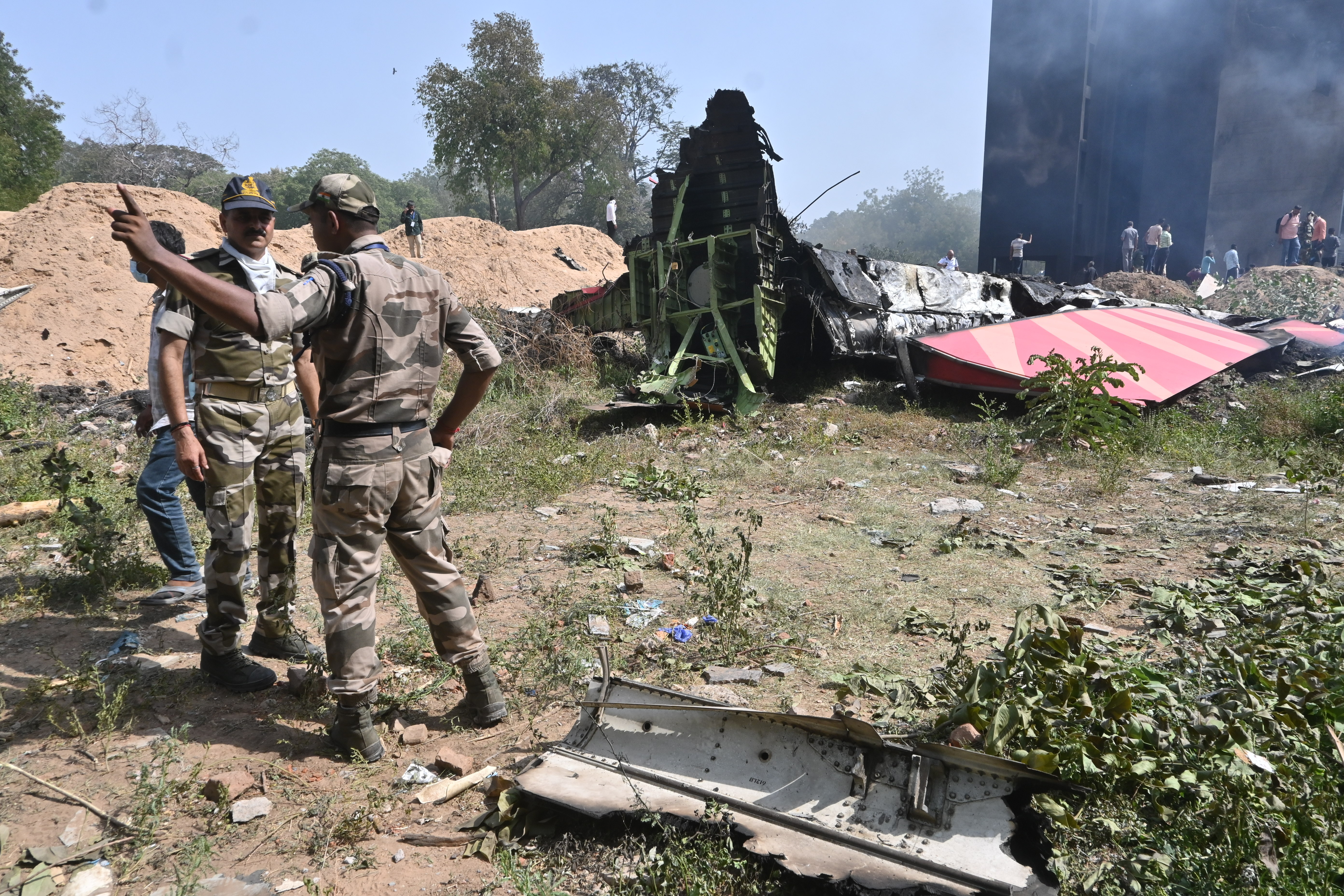 Officials gathered at the plane crash site. | Source: Getty Images