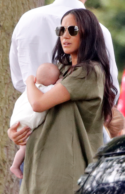 Meghan Markle carries son, Archie, as they attend the King Power Royal Charity Polo Match  at Billingbear Polo Club in Wokingham, England on July 10, 2019. | Source: Getty Images