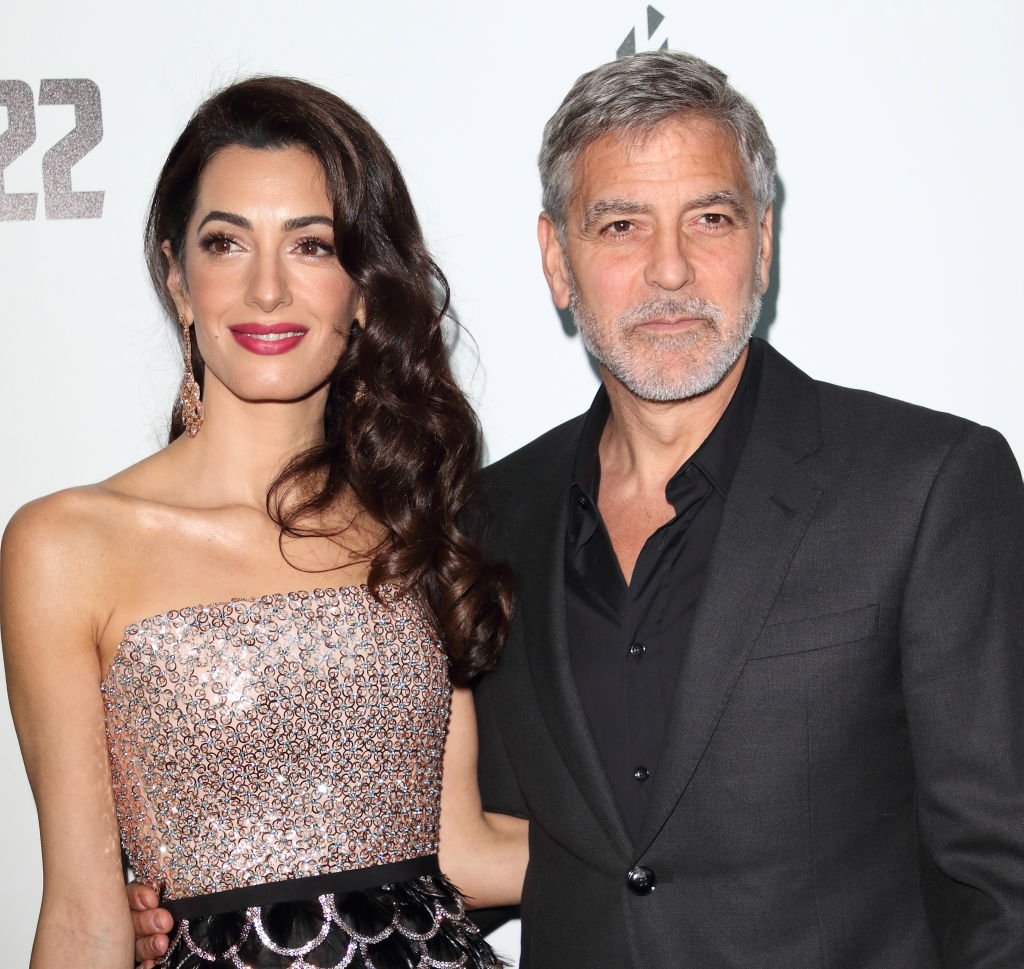 Amal and George Clooney pictured at the "Catch 22," TV Series premiere at the Vue Westfield, 2019, London, England. | Photo: Getty Images