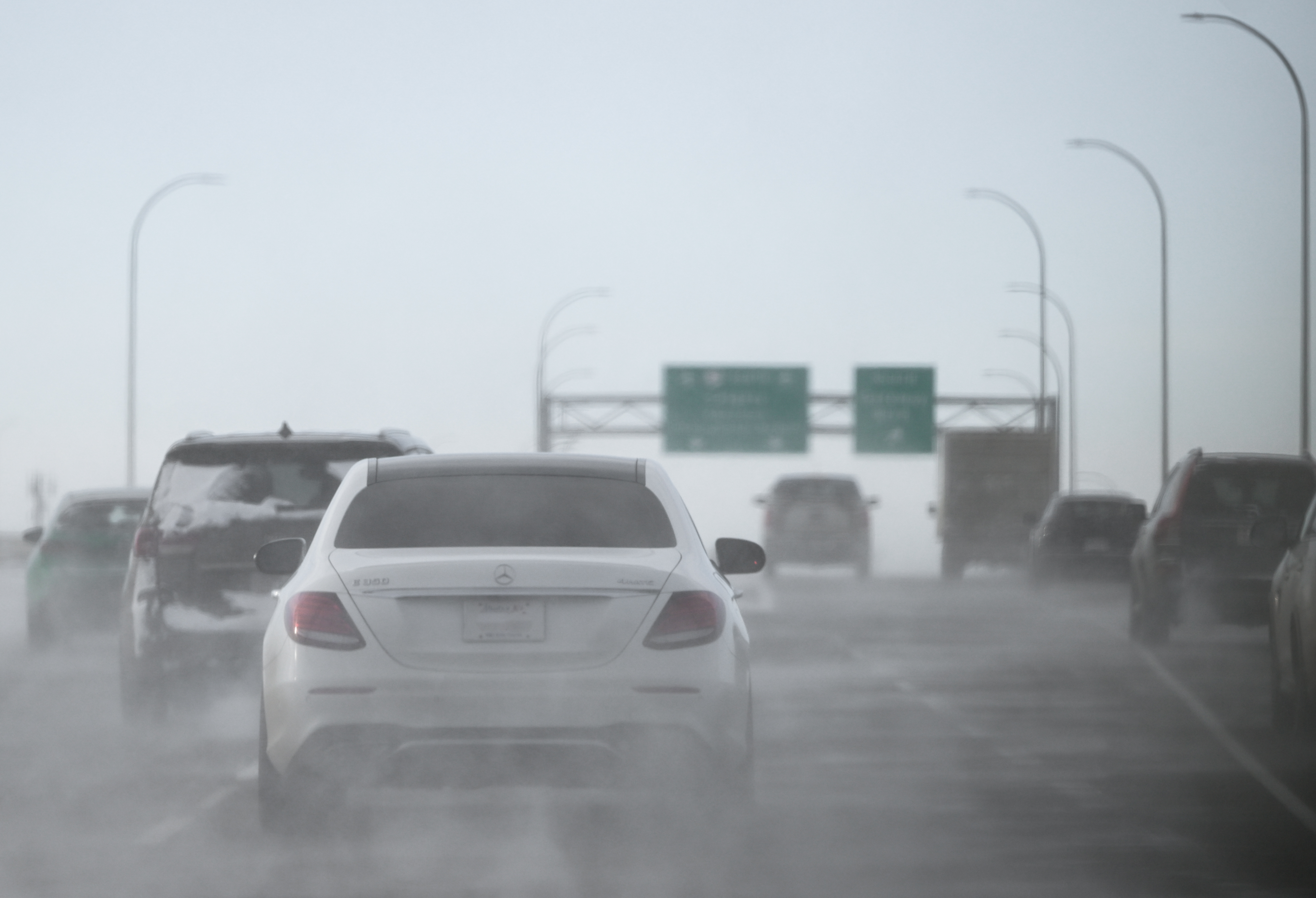 Cars pictured on the road during snow along Anthony Henday Drive on February 1, 2025, in Edmonton, Canada. | Source: Getty Images