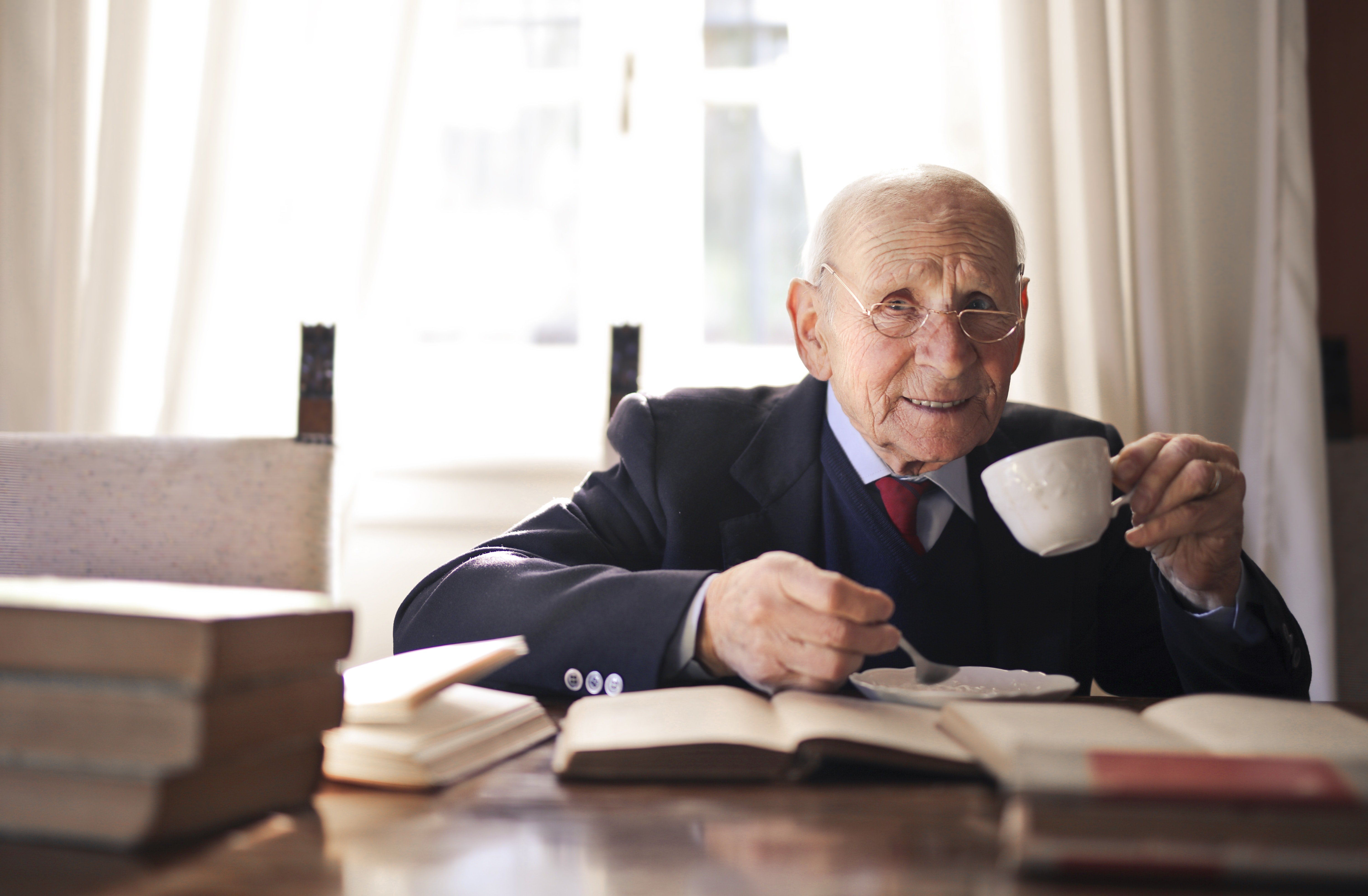 An elderly man having his morning coffee | Source: Pexel
