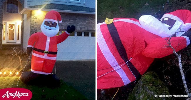 Unknown people brutally slash inflatable black Santa after family put it in their front yard