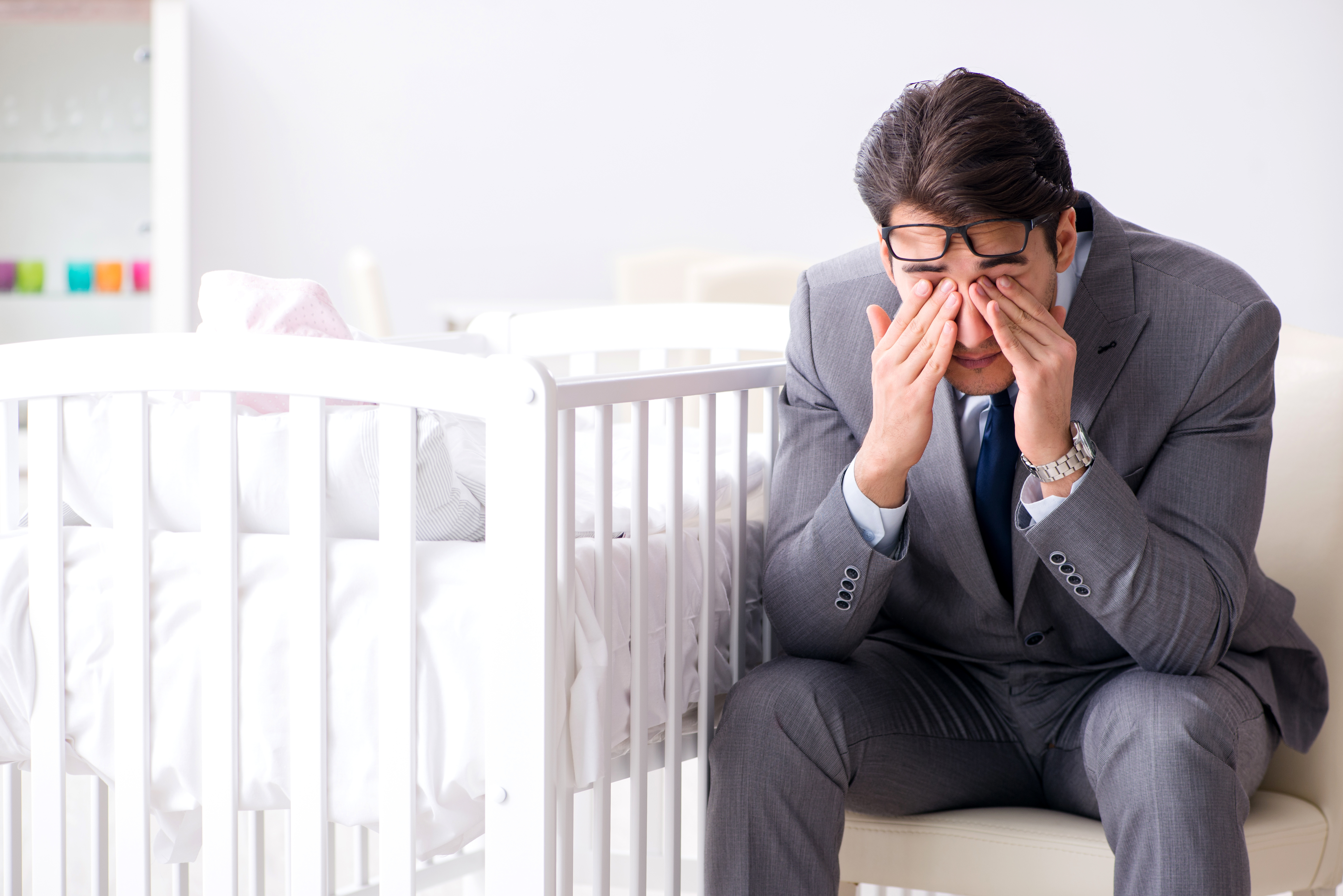 A father looking stressed | Source: Shutterstock