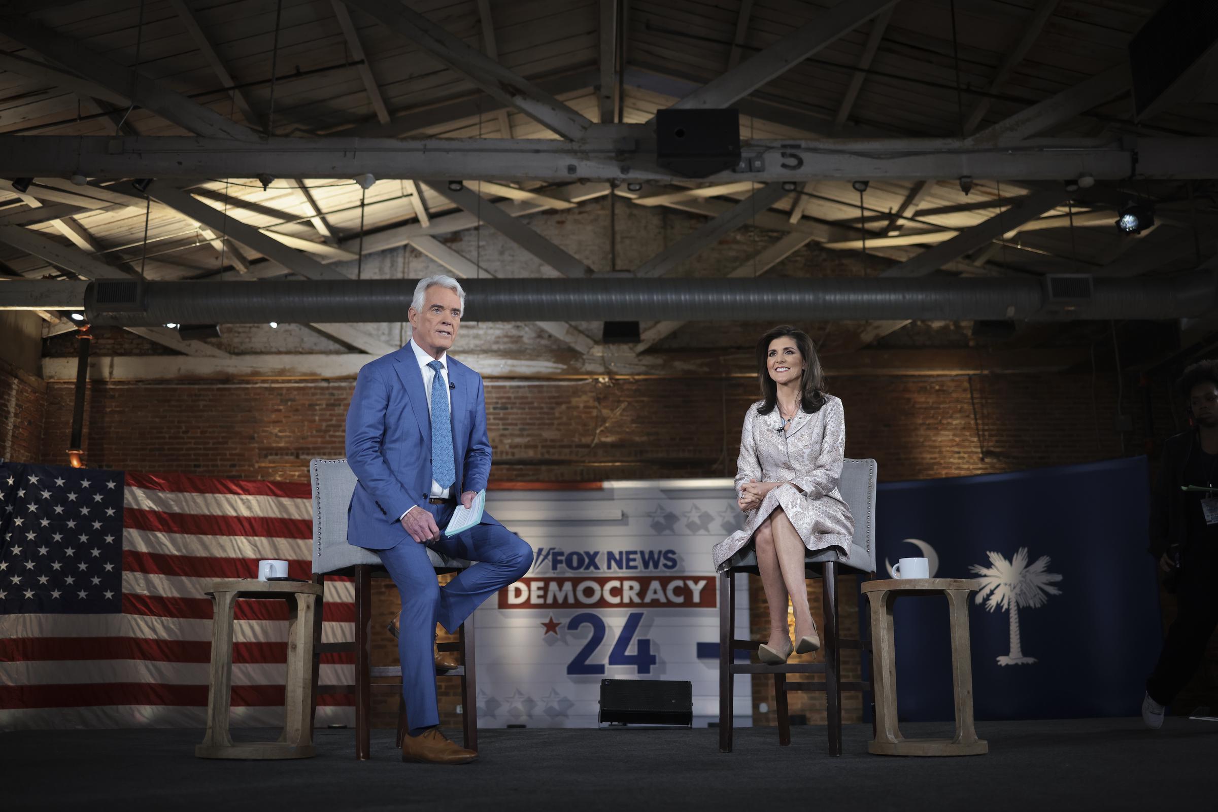 John Roberts and Nikki Haley during a Fox News "Democracy 2024: South Carolina Town Hall" event on February 18 in Columbia. | Source: Getty Images