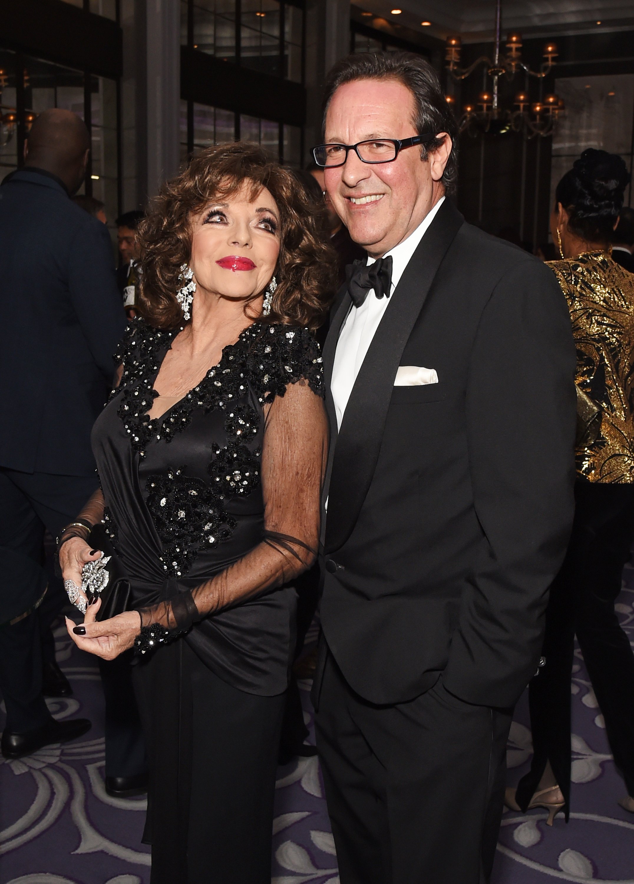 Joan Collins and Percy Gibson at the 8th Global Gift Gala London in aid of Great Ormond Street Hospital Children's Charity on November 18, 2017 | Source: Getty Images