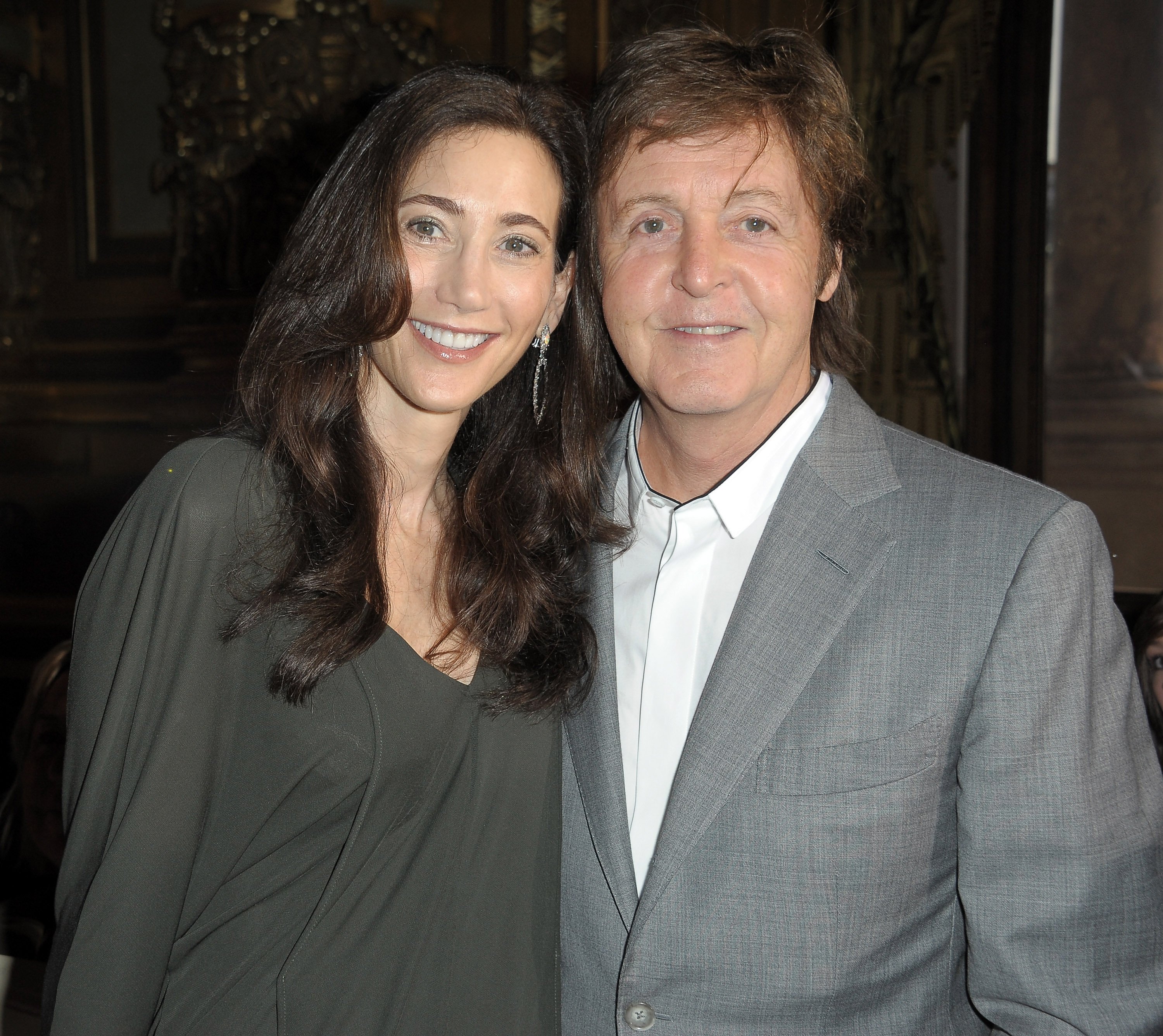 Nancy Shevell and Paul McCartney at the Stella McCartney Ready to Wear Spring/Summer show during Paris Fashion Week on October 4, 2010, in Paris, France | Source: Getty Images