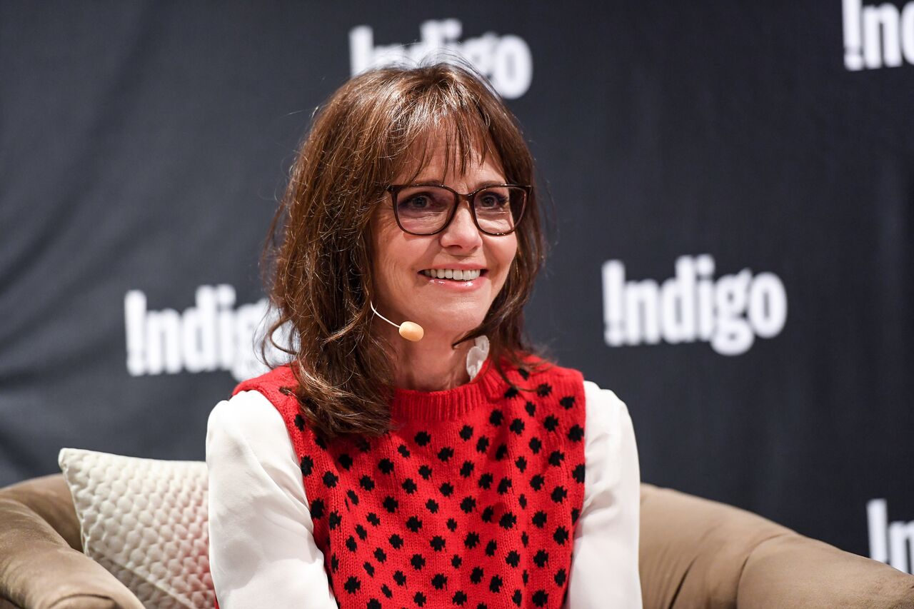 Sally Field signs copies of her book, "In Pieces." | Source: Getty Images