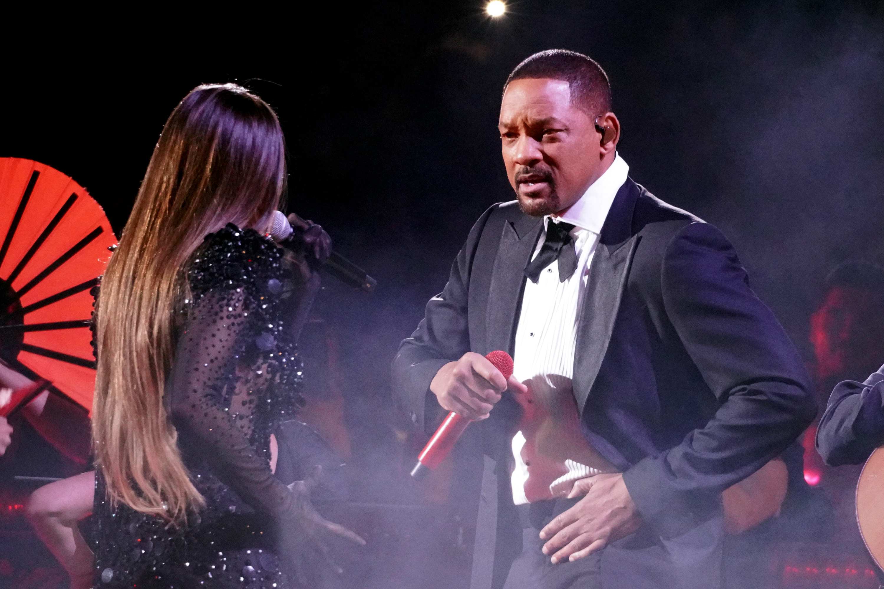 India Martínez and Will Smith perform onstage during Univision's 37th Premio Lo Nuestro at Kaseya Center on February 20, 2025 | Source: Getty Images