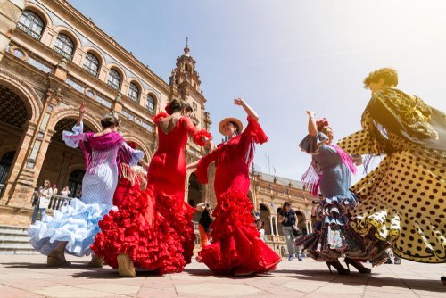 Spanish women dancing the flamenco. | Source: Shutterstock.