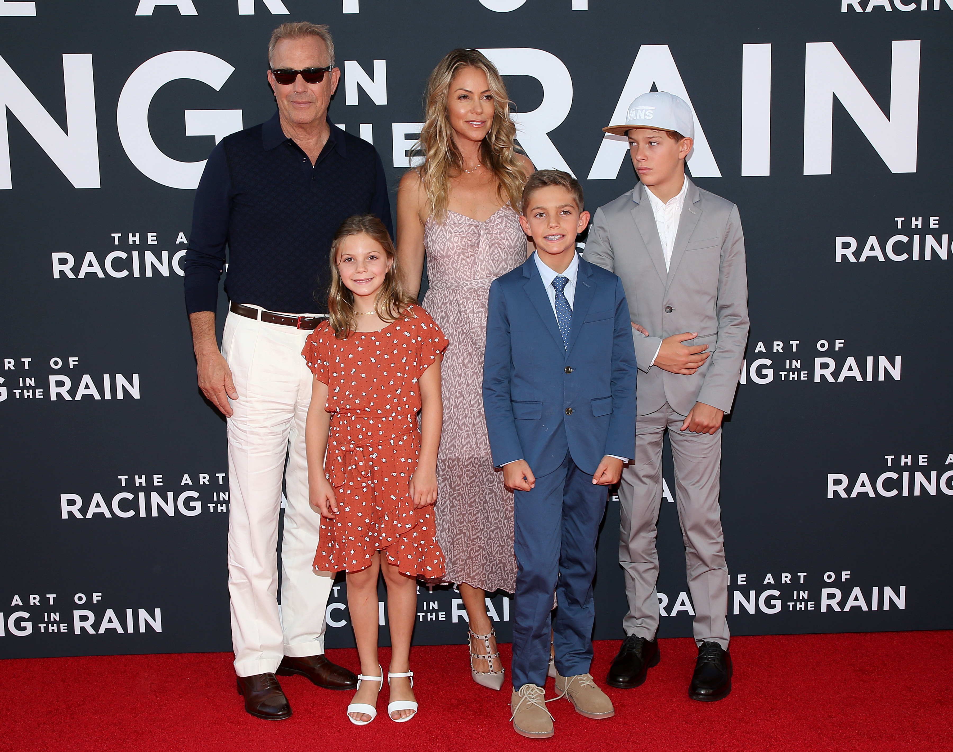 Kevin Costner, Christine Baumgartner, Grace Every, Hayes Logan, and Cayden Wyatt at the premiere of "The Art Of Racing In The Rain" in Los Angeles, California on August 1, 2019. | Source: Getty Images