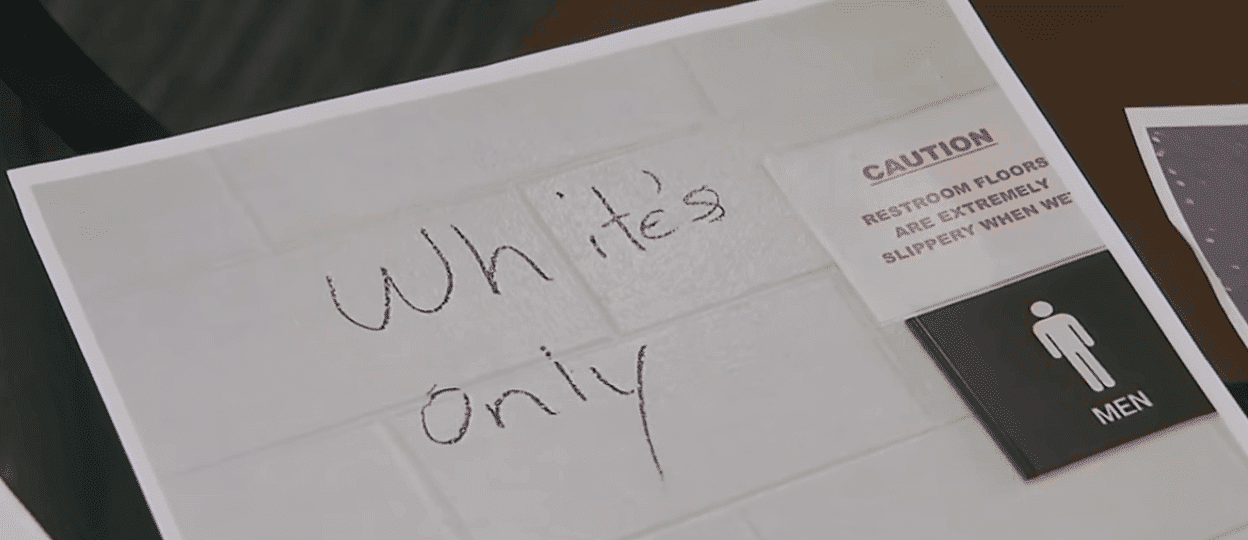 "White's only" sign found scribbled on a bathroom wall. A clear message about black employees not being welcomed at the plant. | Photo: YouTube/CNN