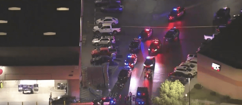 Police standing outside Costco | Photo: CBS Los Angeles