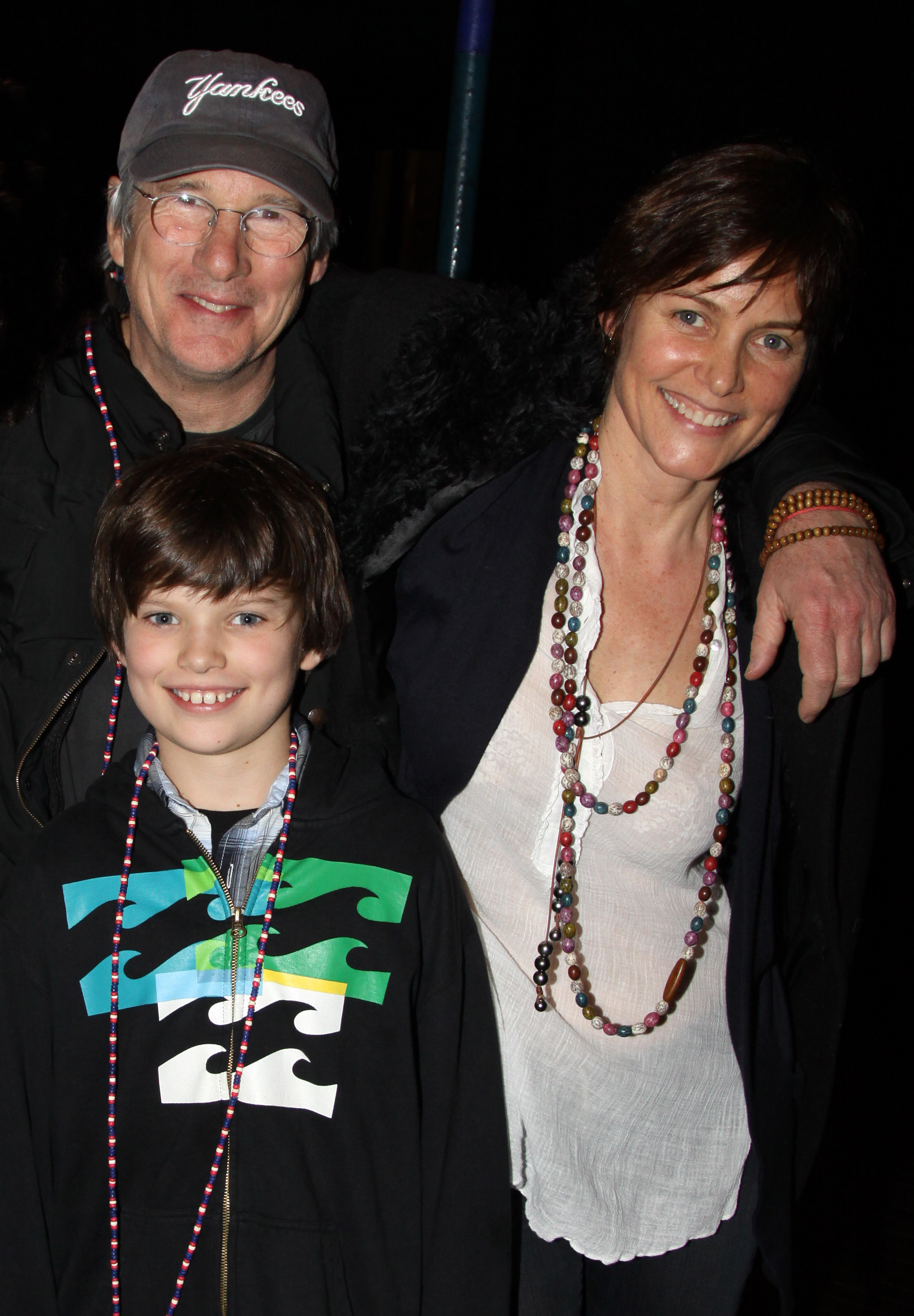 Richard Gere, Homer James Jigme Gere, and Carey Lowell backstage at the Broadway musical "Hair" in New York City on March 14, 2010 | Source: Getty Images