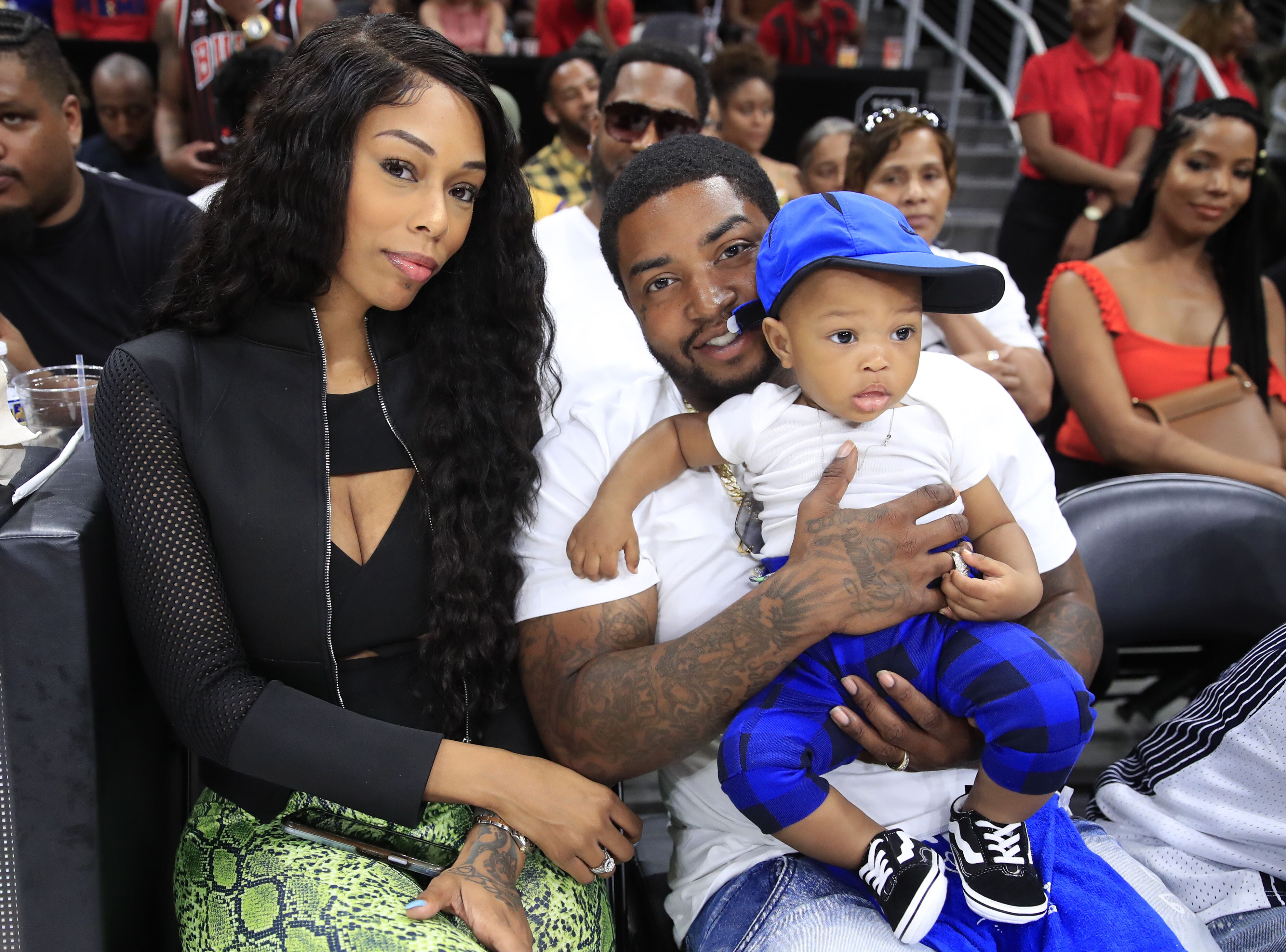 Lil Scrappy and Bambi Benson attend an NBA game with their son Prince Breland | Source: Getty Images/GlobalImagesUkraine