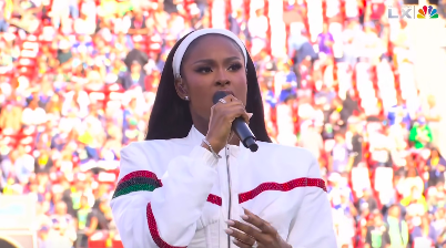 Coco Jones singing "Lift Every Voice and Sing" with passion during the 2026 Super Bowl. | Source: Facebook/Essence