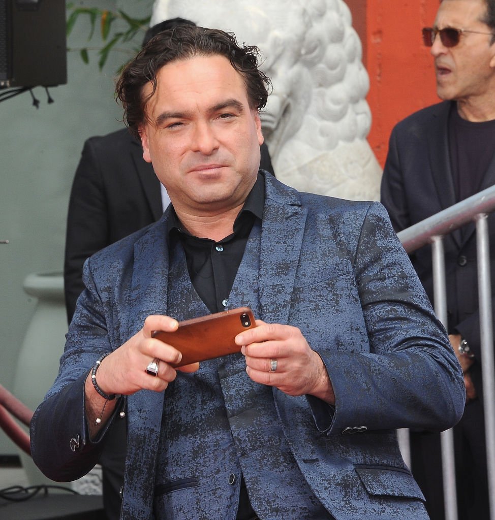 Johnny Galecki takes photos after The Cast Of "The Big Bang Theory" Handprints Cement Ceremony At The TCL Chinese Theatre IMAX Forecourt held | Photo: Getty Images