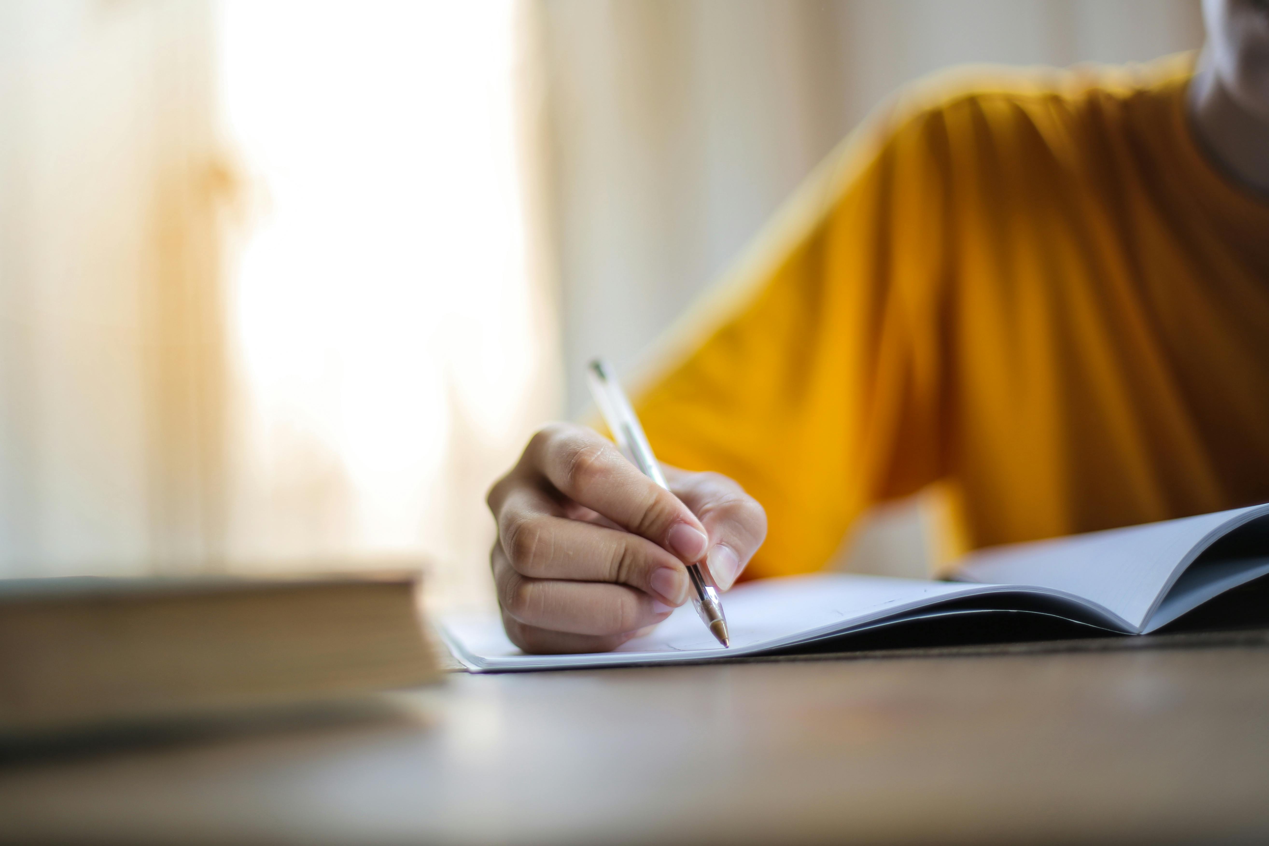 A person doing homework | Source: Pexels