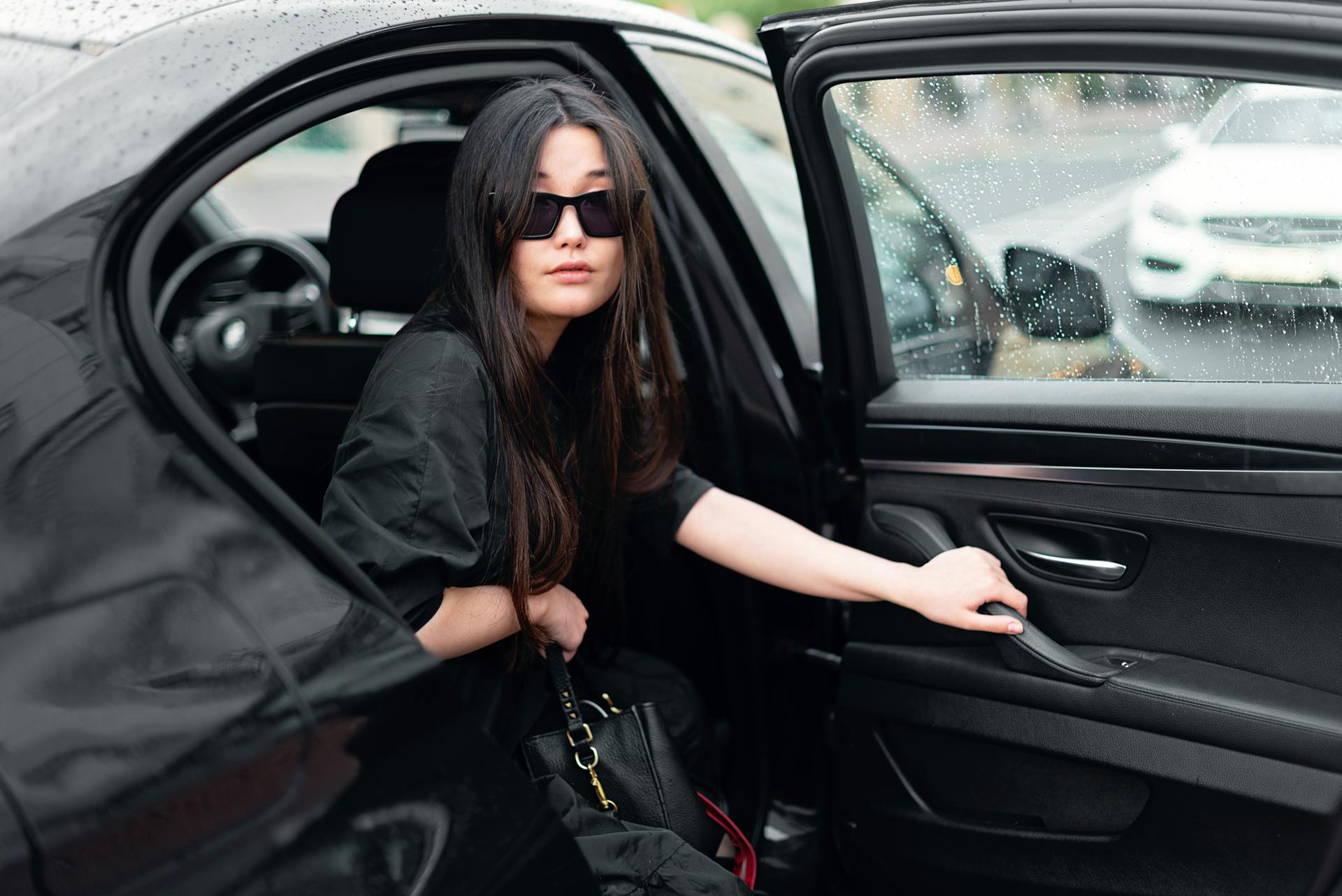 A woman stepping out of a car | Source: Pexels