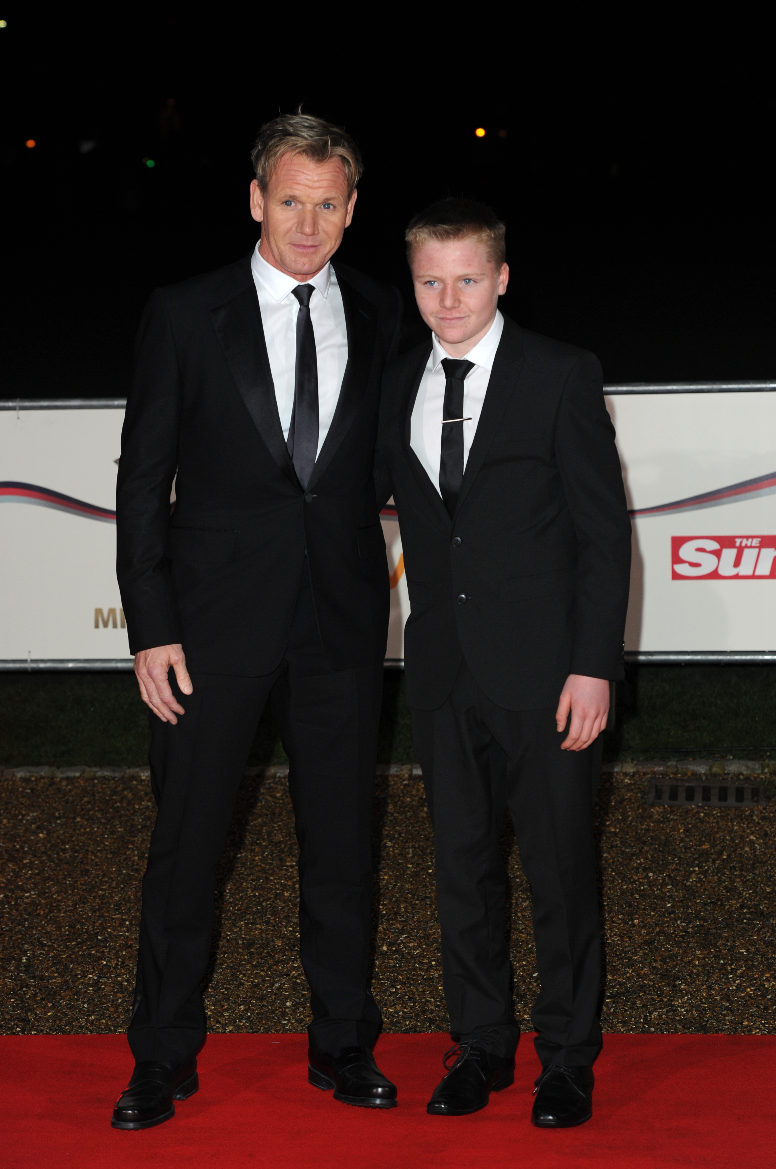 Gordon and Jack Ramsay posed on the red carpet at "A Night of Heroes: The Sun Military Awards" on December 11, 2013, in London. Both dressed in sharp black suits and ties, the father-son duo attended the event honouring British servicemen and women — an occasion that would later echo Jack's own commitment to service when he joined the Royal Marines.