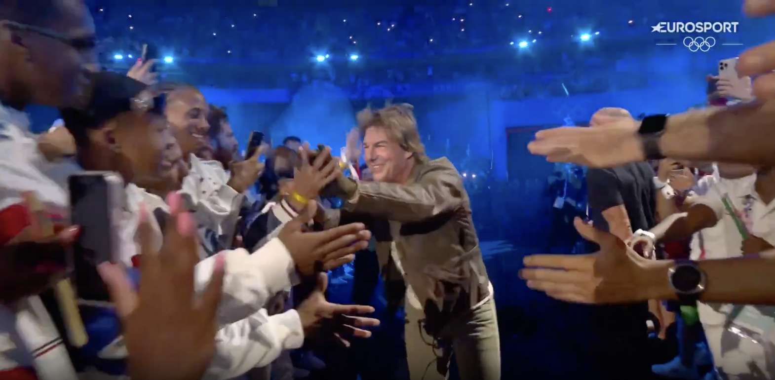 Tom Cruise interacting with fans during the closing ceremony of the Paris Olympics, posted on August 12, 2024 | Source: YouTube/Eurosport