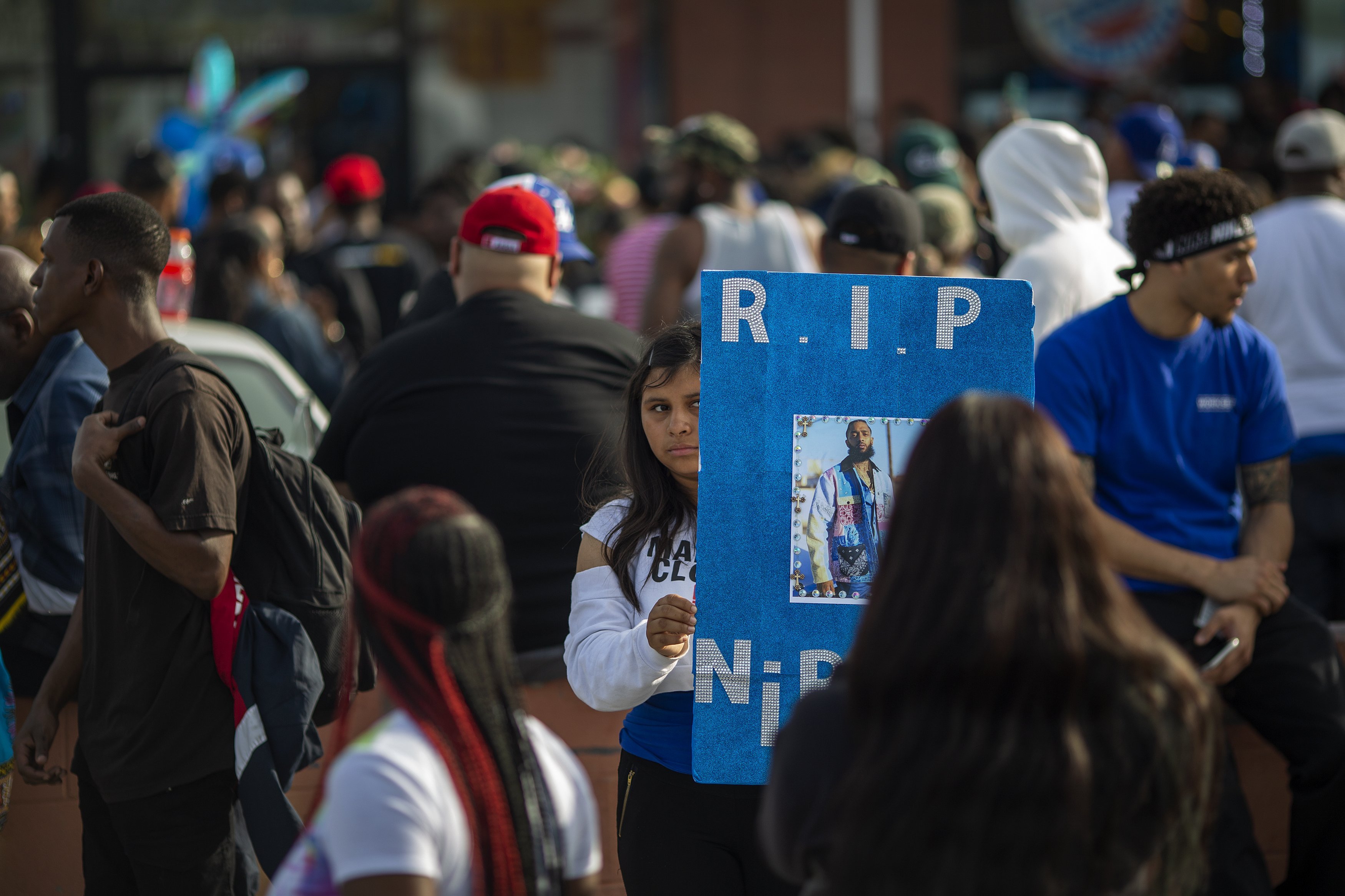 Mourners pay their respects in Crenshaw, Los Angeles, after the murder of Nipsey Hussle. Photo: Getty Images/GlobalImagesUkraine