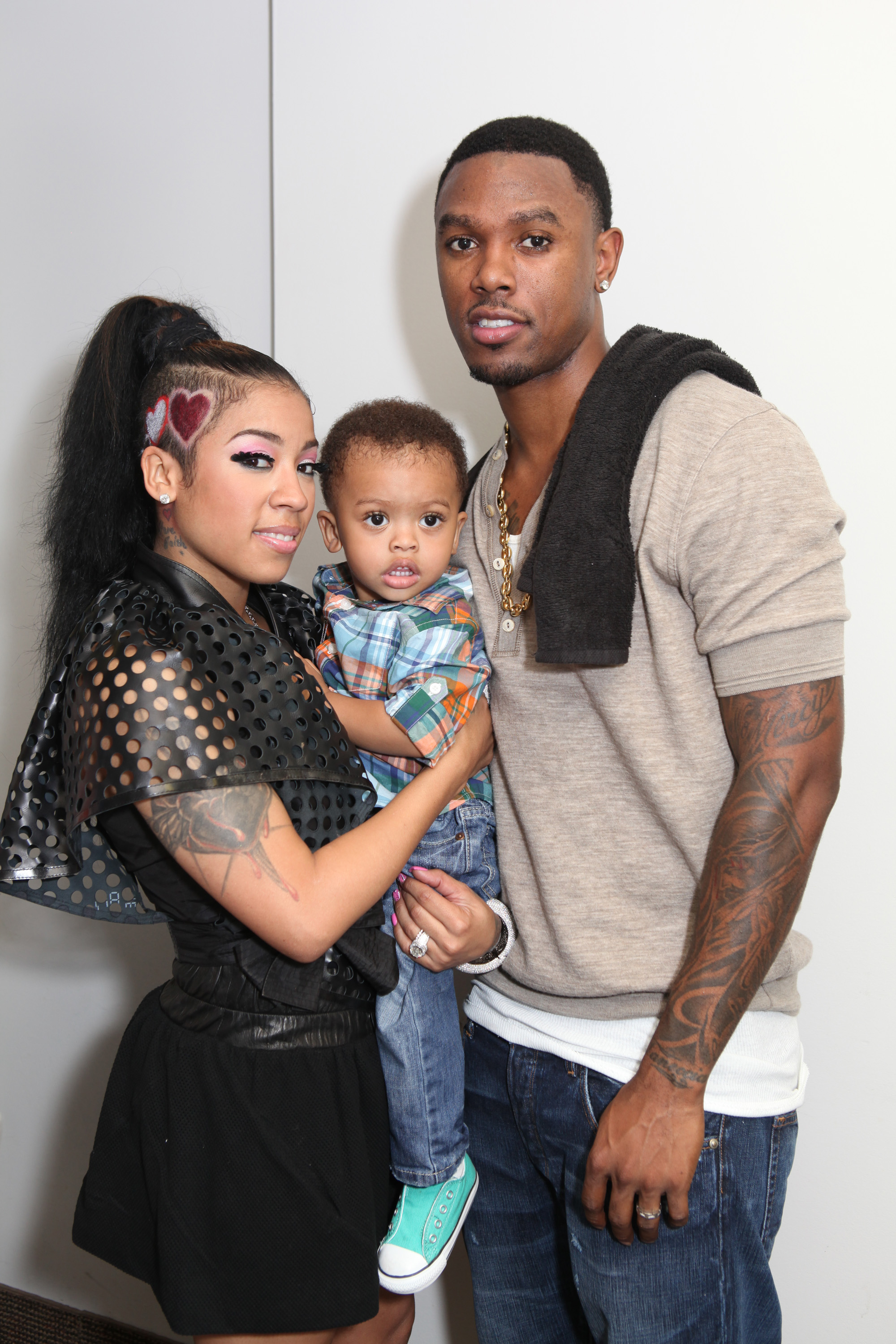 Keyshia Cole, her son Daniel Gibson Jr., and Daniel Gibson at Chene Park Amphitheater on July 29, 2011, in Detroit, Michigan | Source: Getty Images