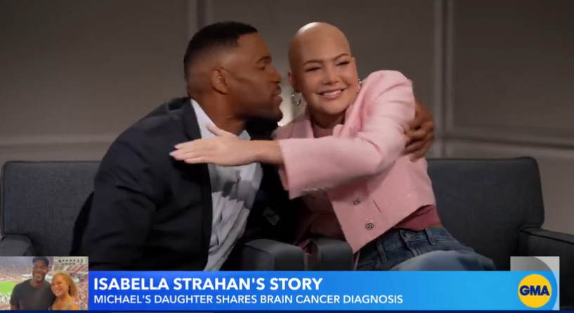Michael Strahan comforts his daughter Isabella as she tears up sharing her story on "GMA" from a video dated January 11, 2024 | Source: twitter.com/GMA