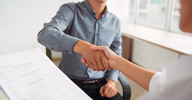 A photo of two men shaking hands | Photo: Shutterstock.com