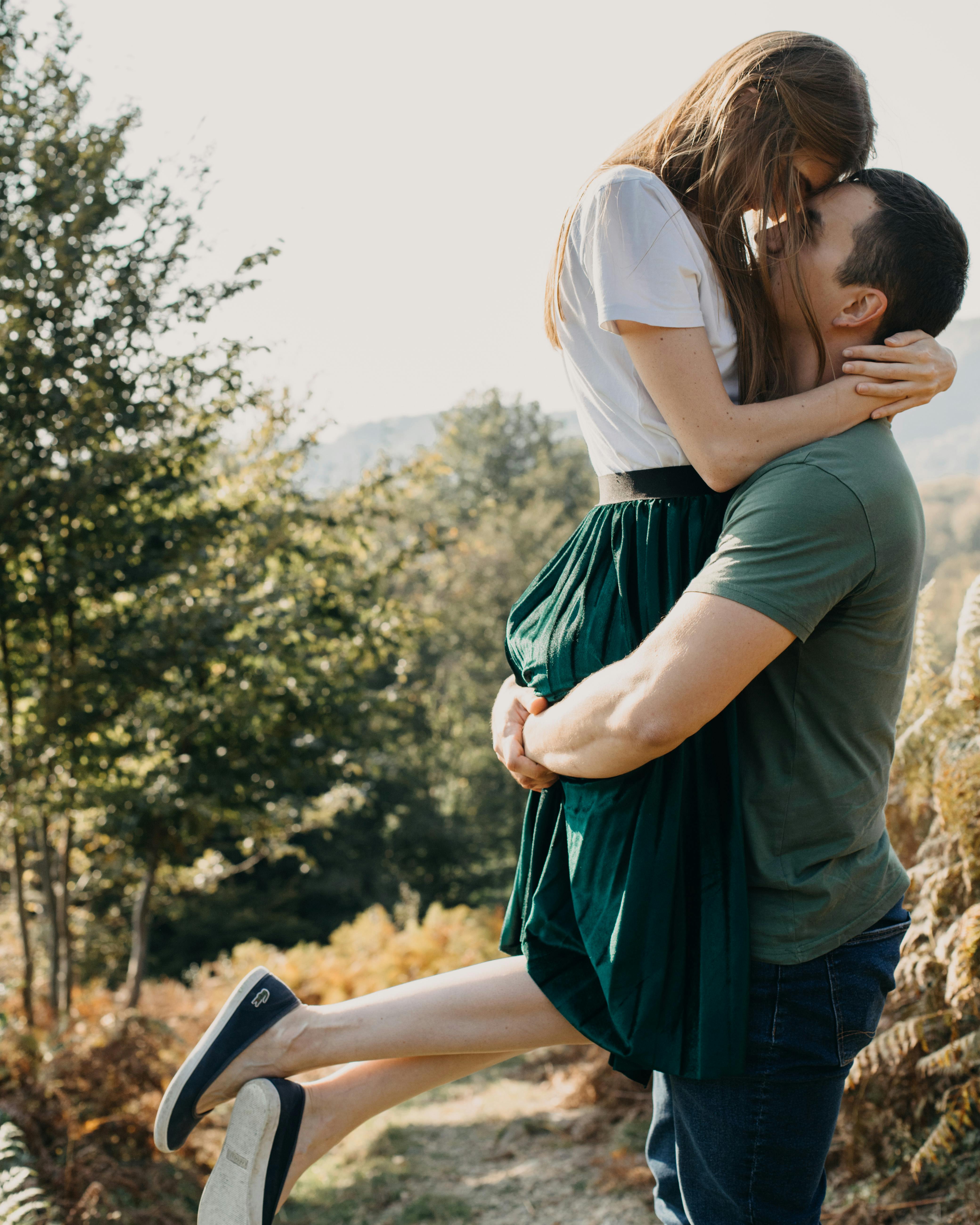 A happy young couple poses for a photo | Source: Dmitriy Ganin on Pexels