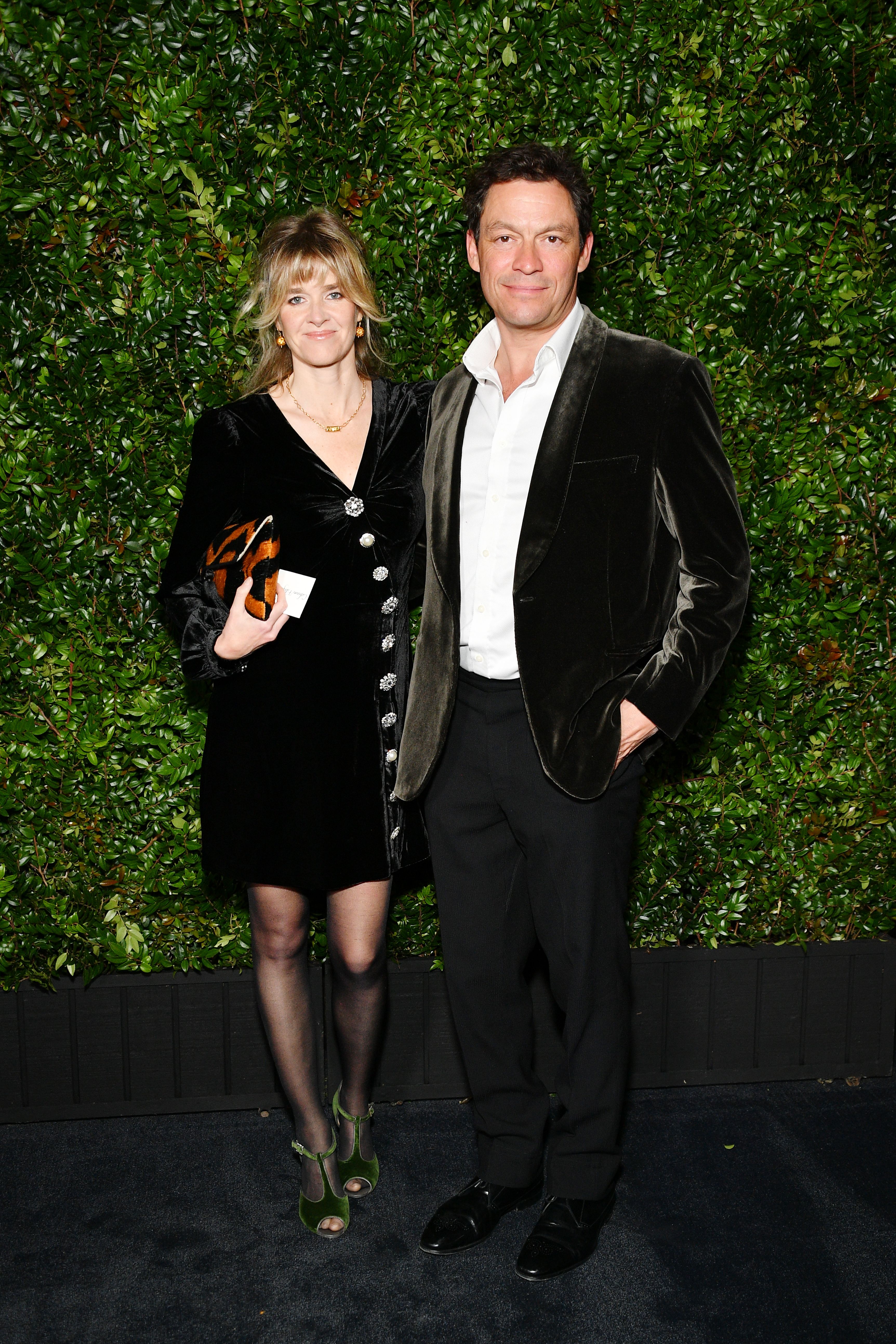 Dominic West and Catherine Fitzgerald at the Chanel And Charles Finch Pre-Oscar Awards Dinner in 2019 in Hollywood | Source: Getty Images
