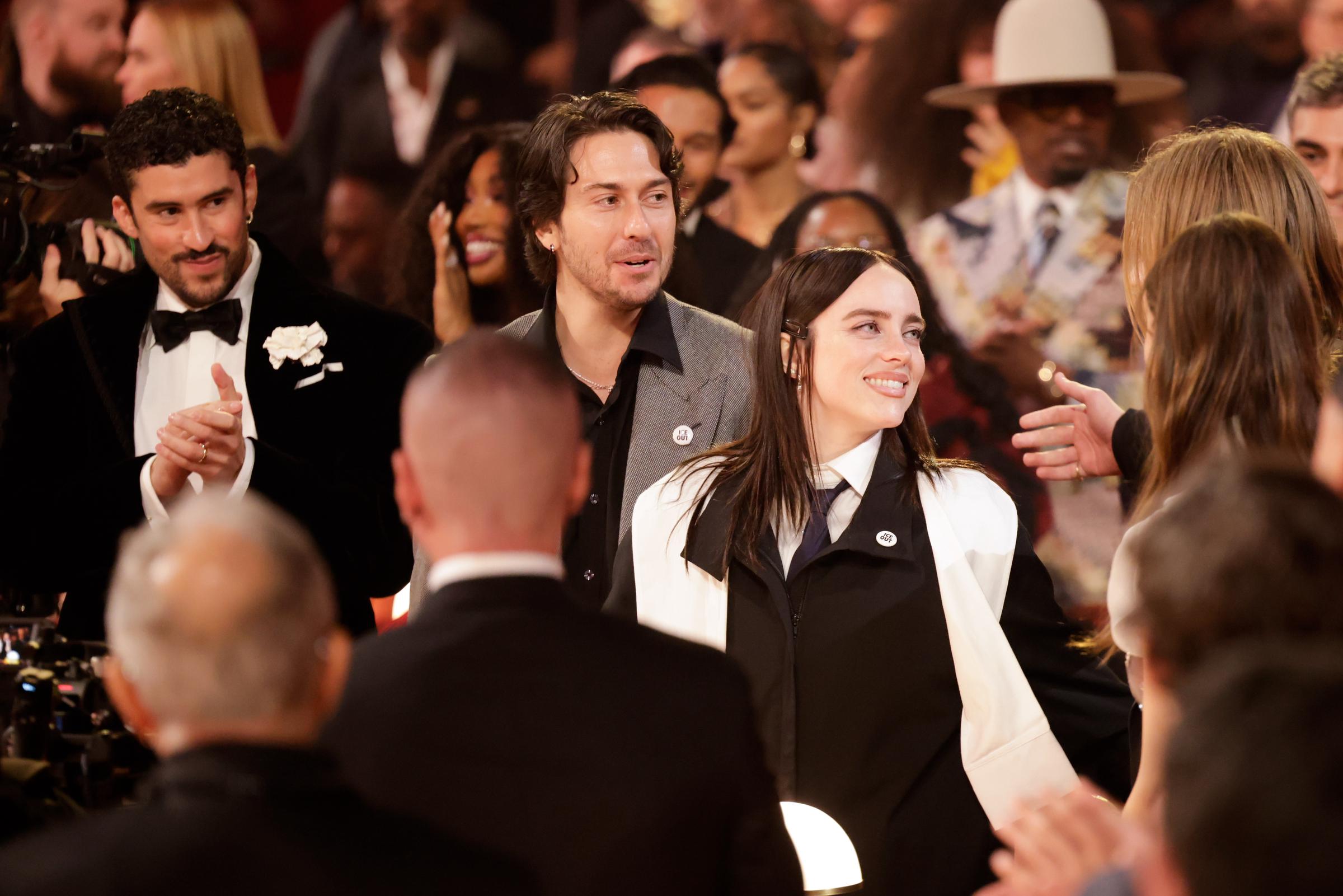 Bad Bunny, Nat Wolff and Billie Eilish attend the Grammy Awards at Crypto.com Arena on February 1, 2026, in Los Angeles, California | Source: Getty Images