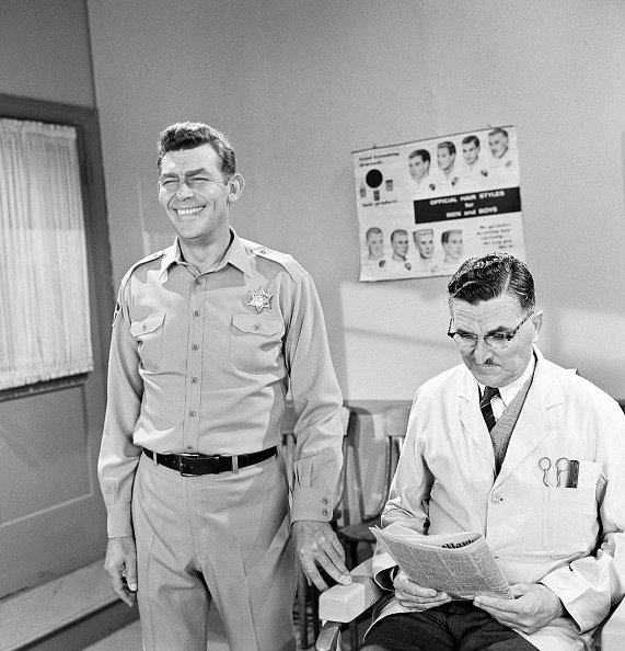 Andy Griffith as Sheriff Andy Taylor and Howard McNear as barber Floyd Lawson in a scene from the television series "The Andy Griffith Show," circa 1966. | Photo: Getty Images